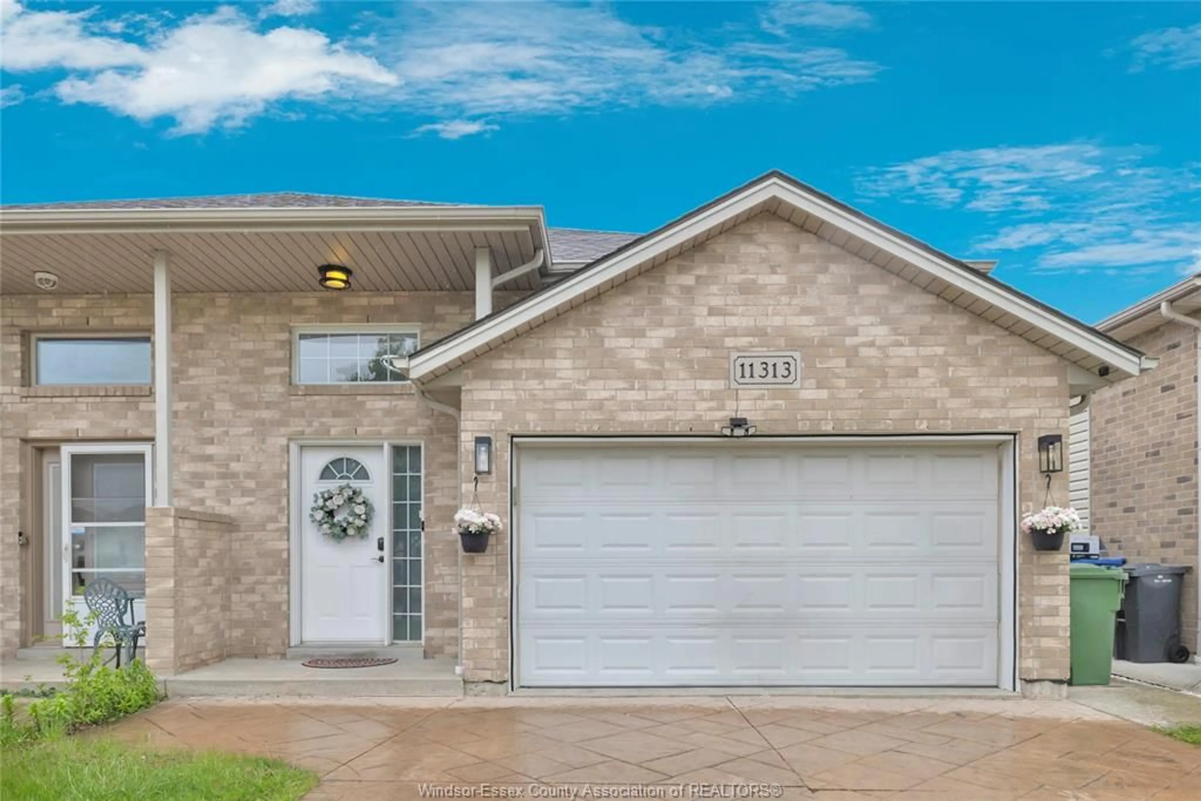 Home with vinyl exterior material, street for 11313 TIMBER BAY, Windsor Ontario N8R 2L2