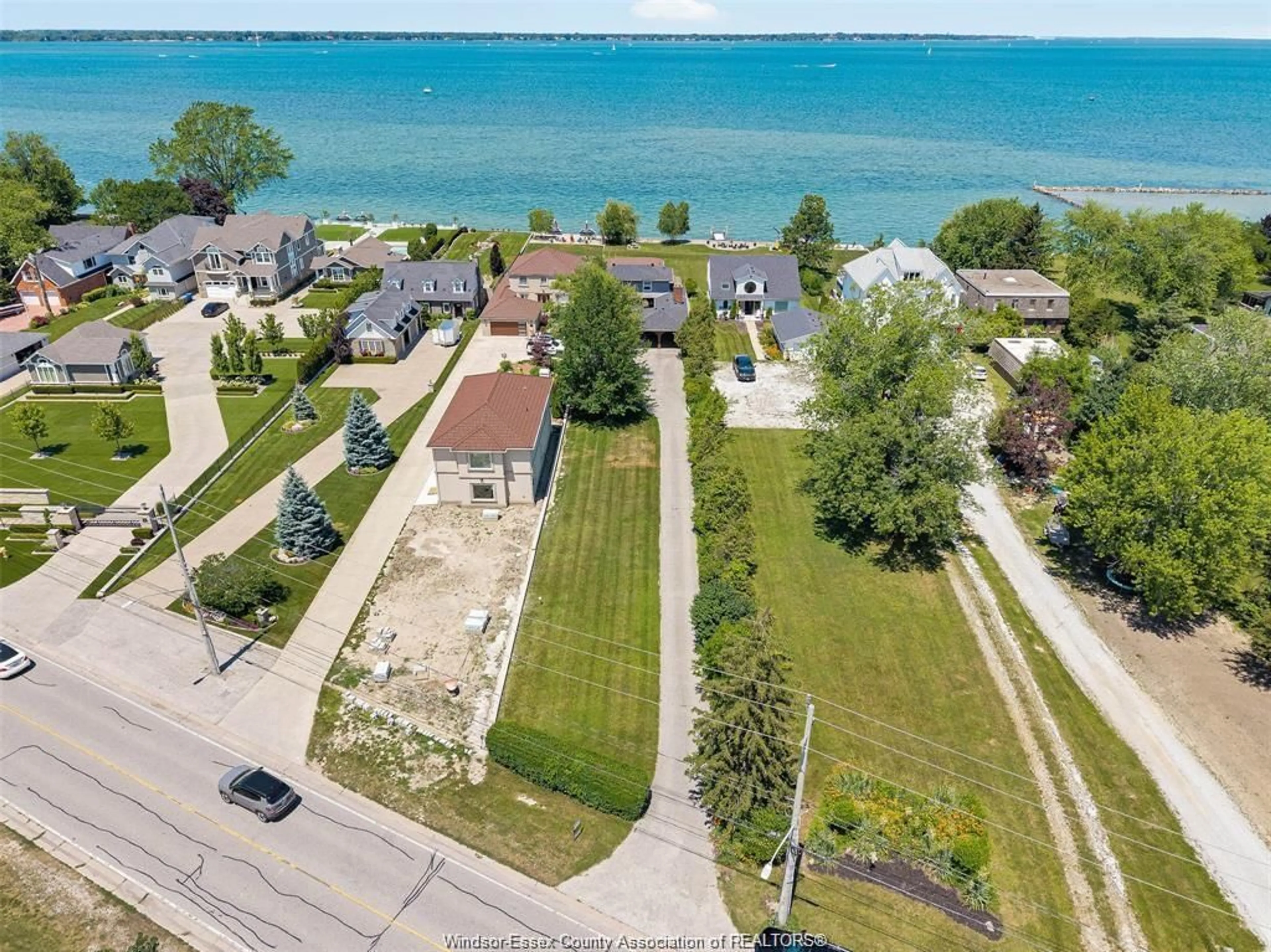 A pic from outside/outdoor area/front of a property/back of a property/a pic from drone, water/lake/river/ocean view for 11830 RIVERSIDE Dr, Windsor Ontario N8P 1A6