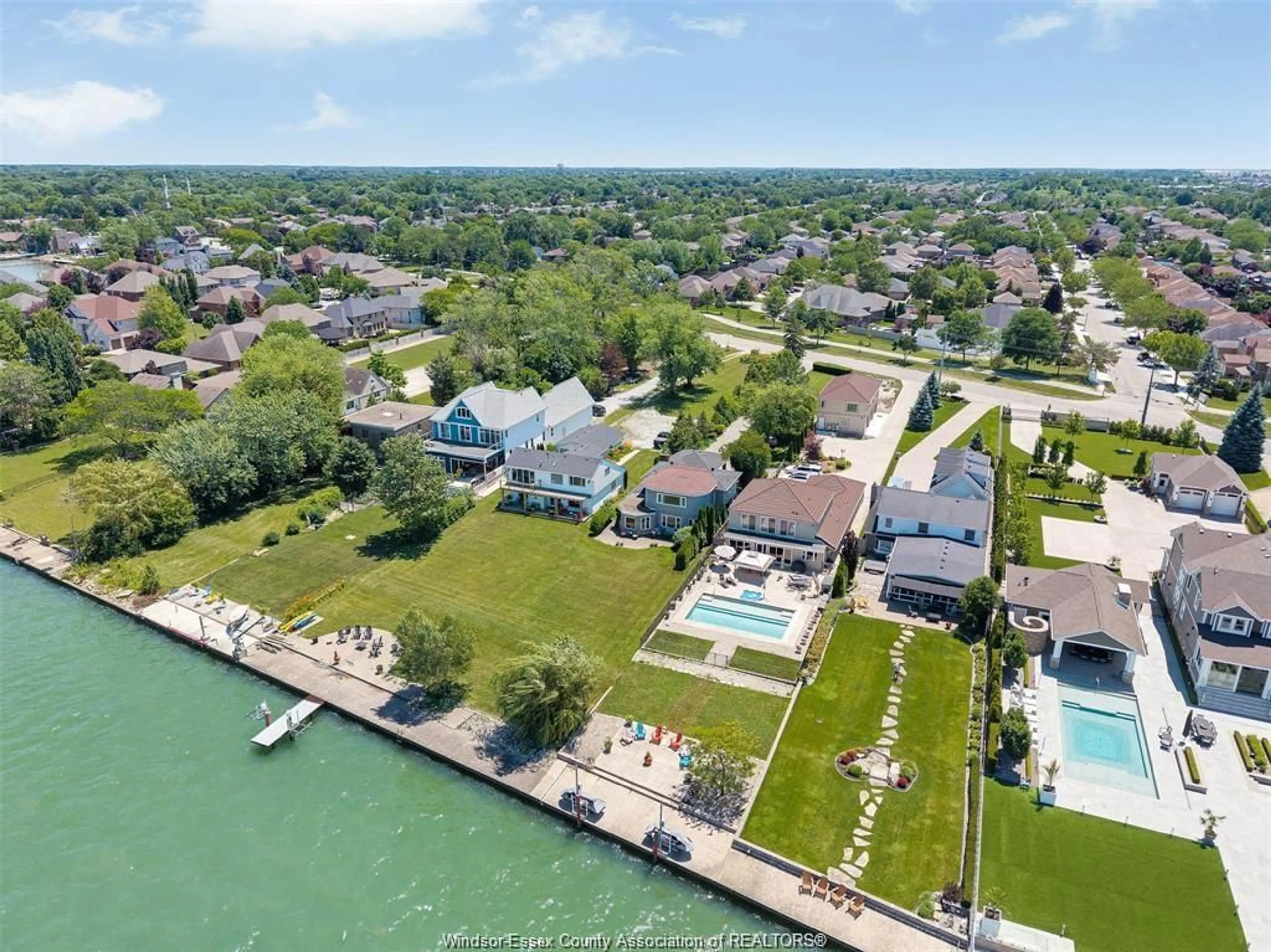 A pic from outside/outdoor area/front of a property/back of a property/a pic from drone, water/lake/river/ocean view for 11830 RIVERSIDE Dr, Windsor Ontario N8P 1A6
