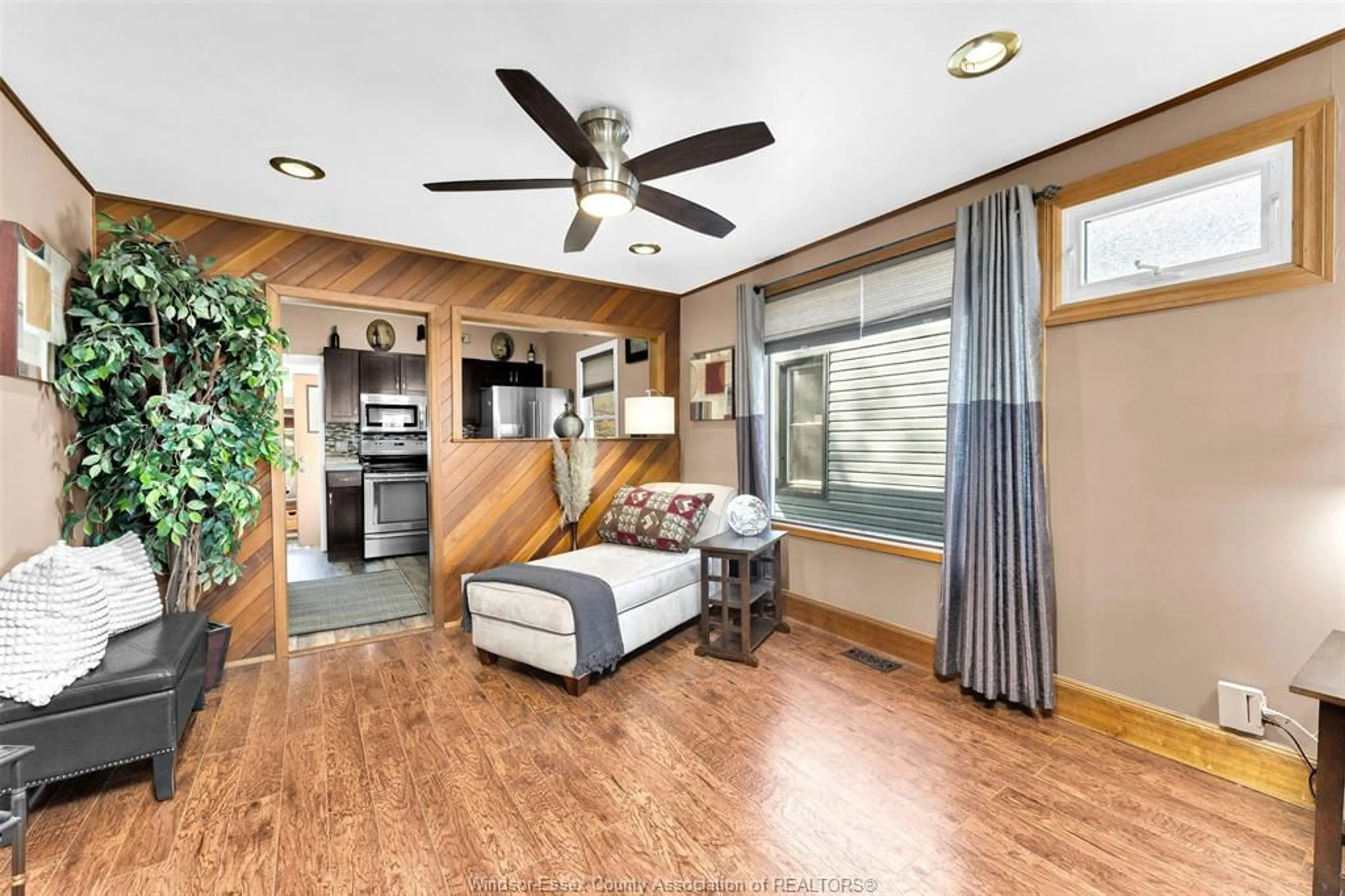 Living room with furniture, wood/laminate floor for 1517 GLADSTONE Ave, Windsor Ontario N8X 1Z3