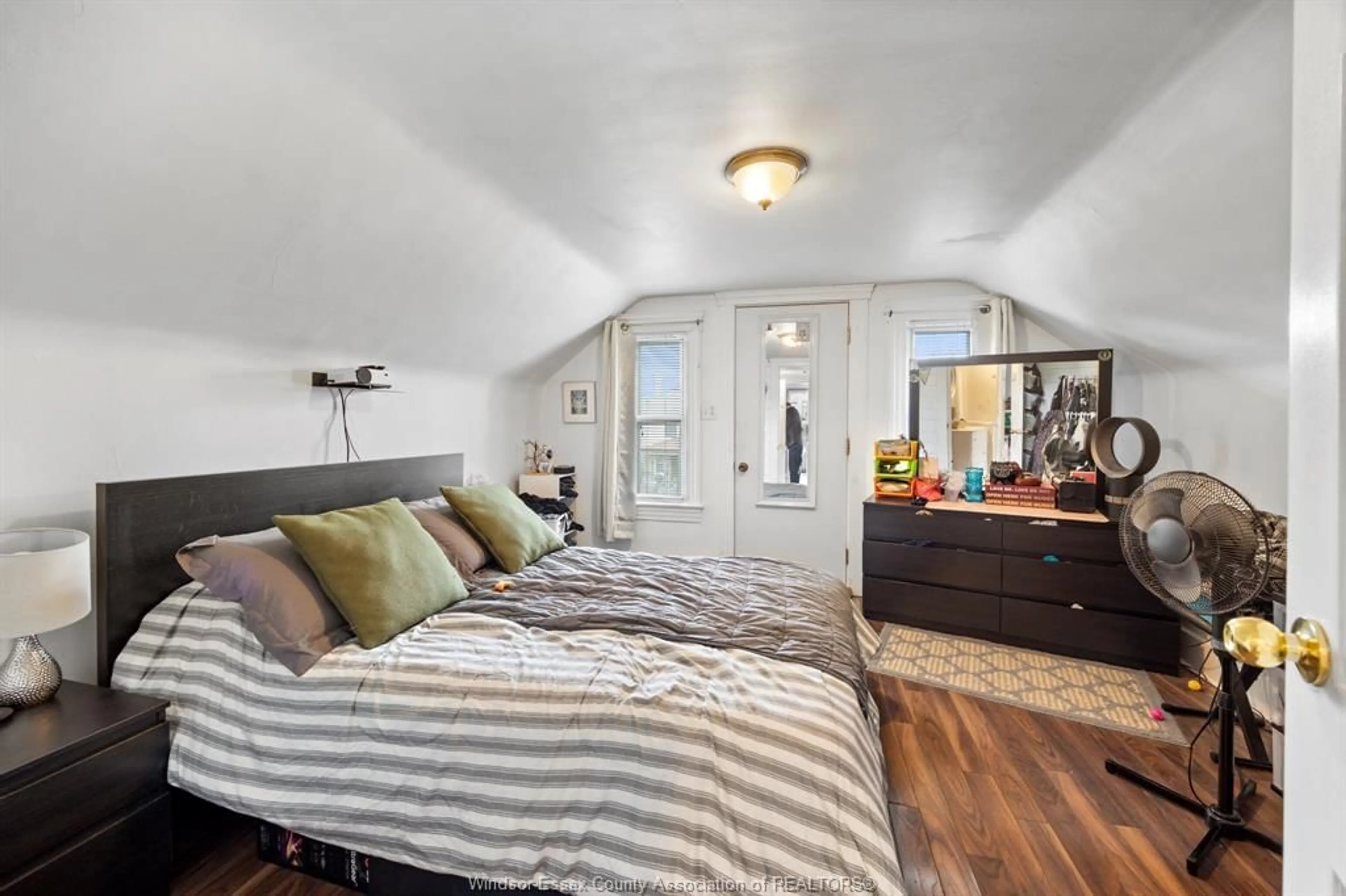 Bedroom with bed, wood/laminate floor for 1130 Langlois, Windsor Ontario N9A 2H5