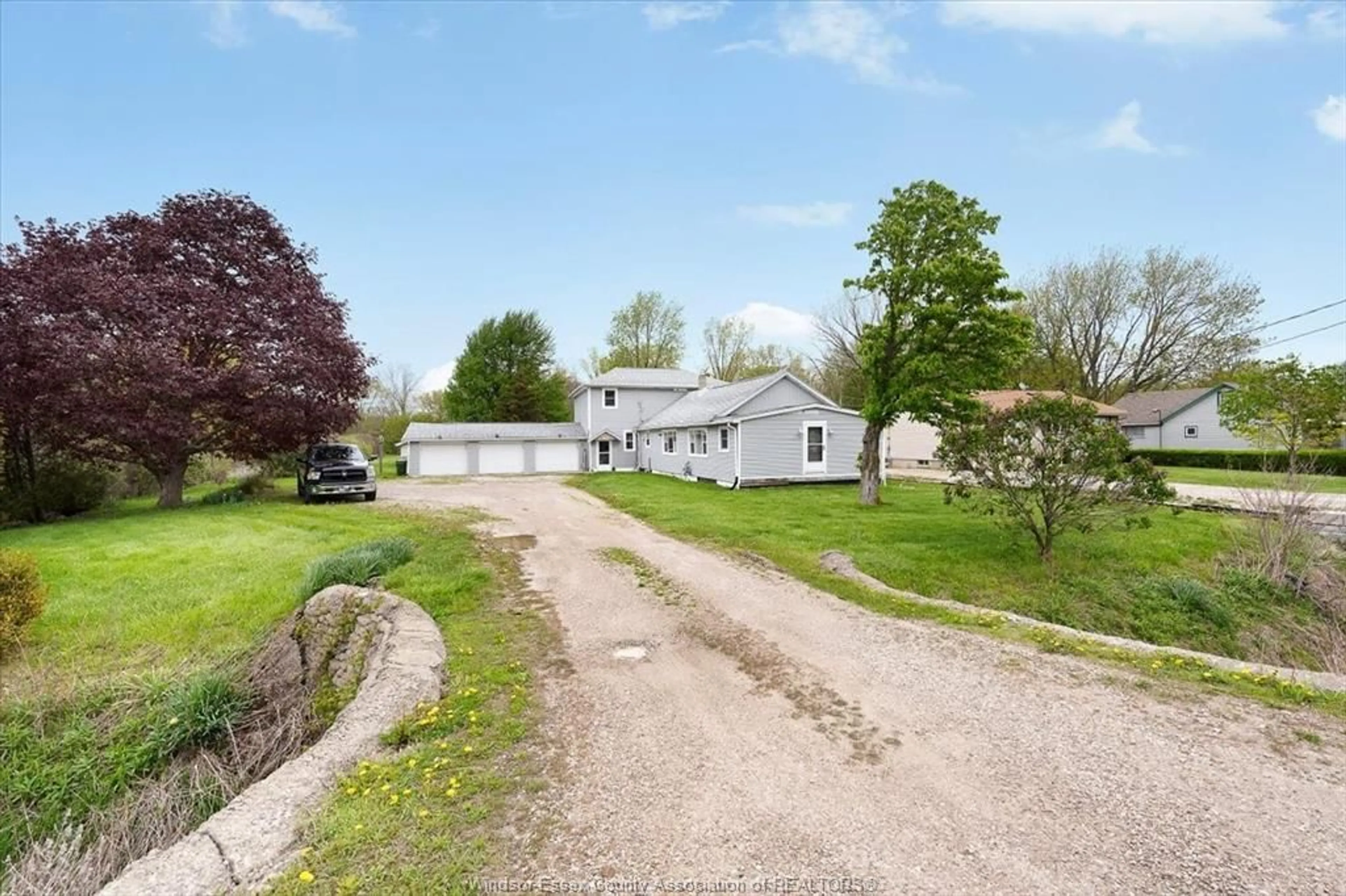 A pic from outside/outdoor area/front of a property/back of a property/a pic from drone, street for 2400 COUNTY RD 20, Harrow Ontario N0R 1G0
