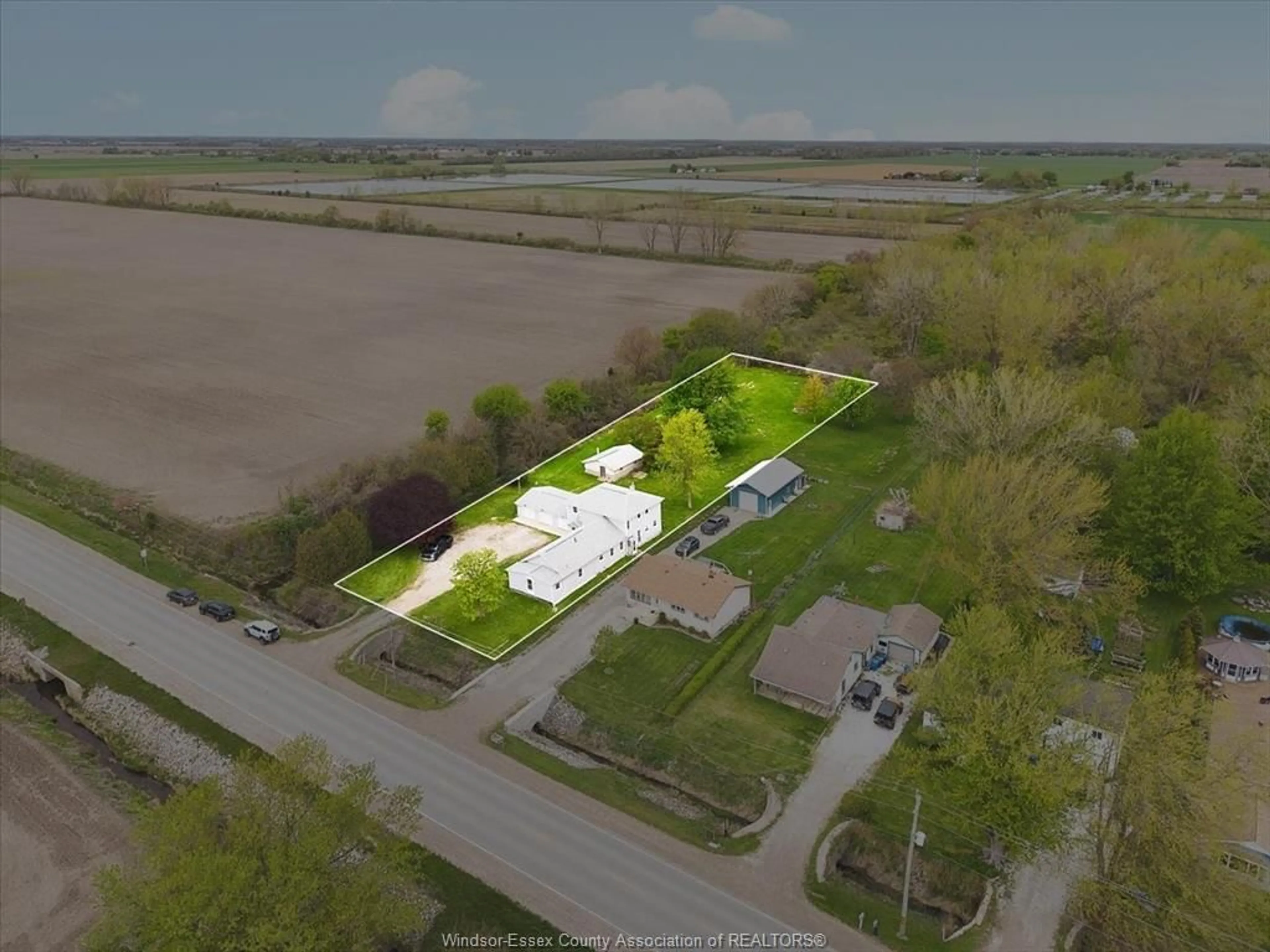 A pic from outside/outdoor area/front of a property/back of a property/a pic from drone, street for 2400 COUNTY RD 20, Harrow Ontario N0R 1G0