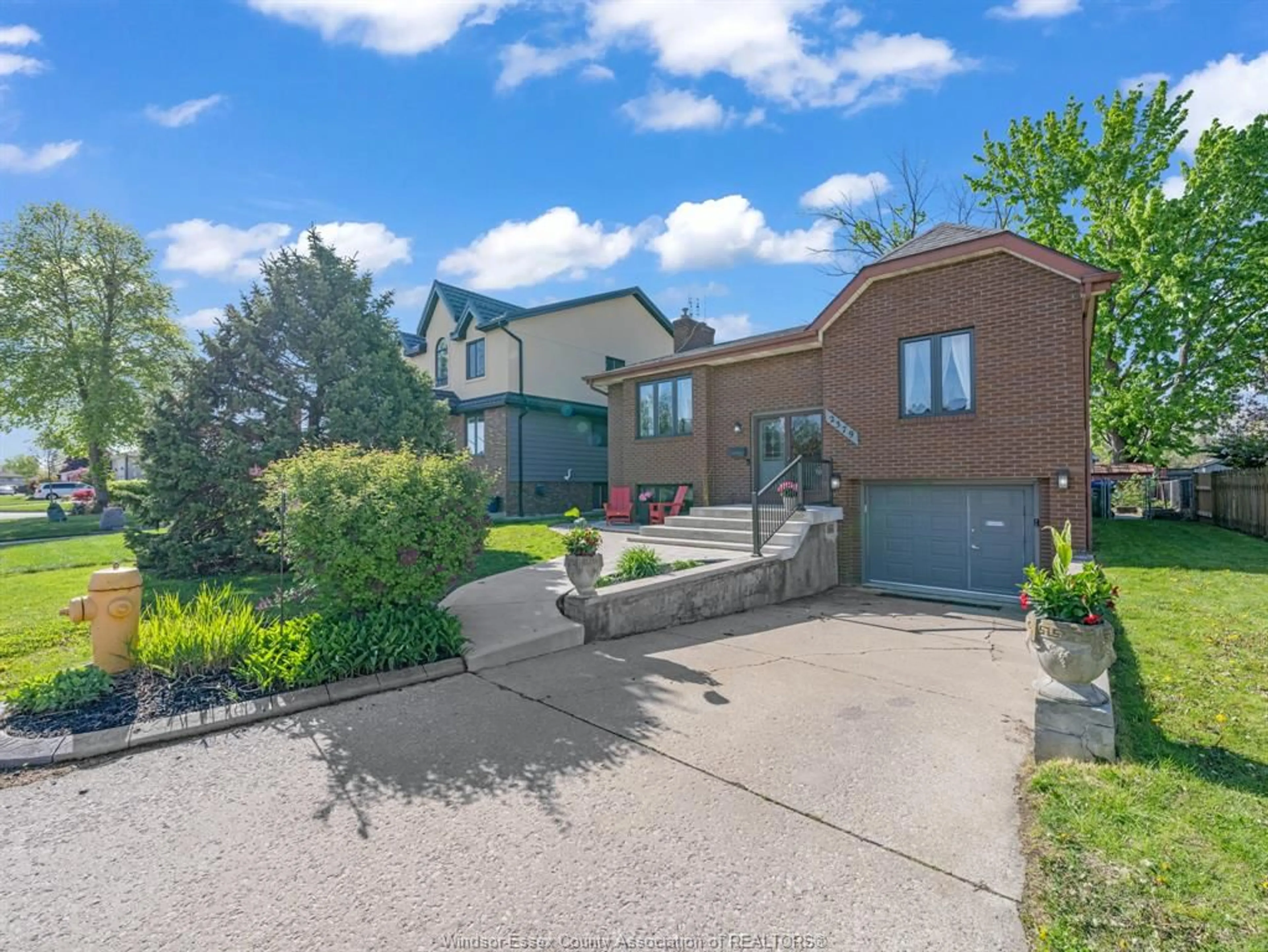 A pic from outside/outdoor area/front of a property/back of a property/a pic from drone, street for 2379 VIA VITA, Windsor Ontario N9E 4G5