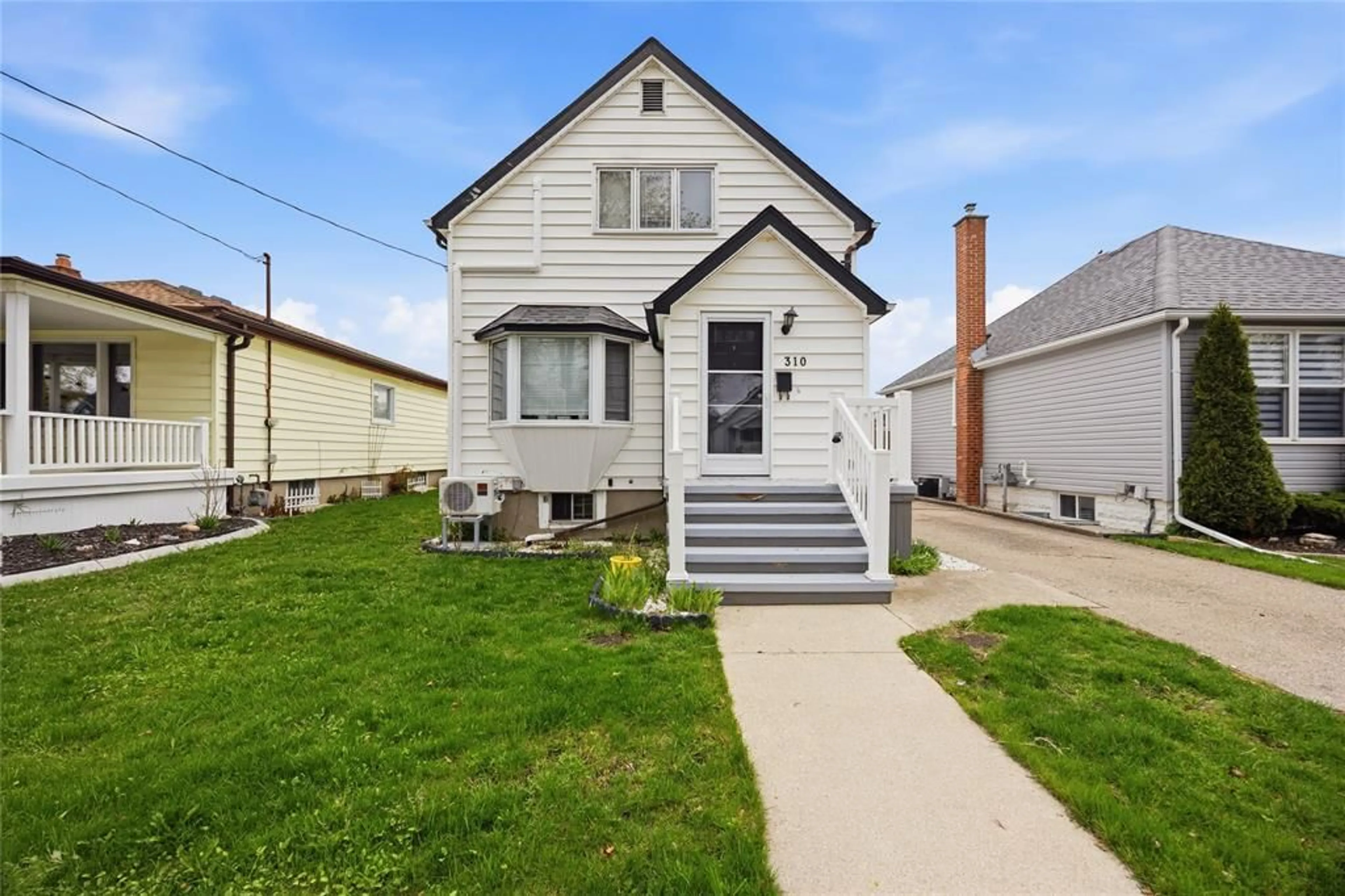 Home with vinyl exterior material, street for 310 Conrad St, Sarnia Ontario N7T 3K6