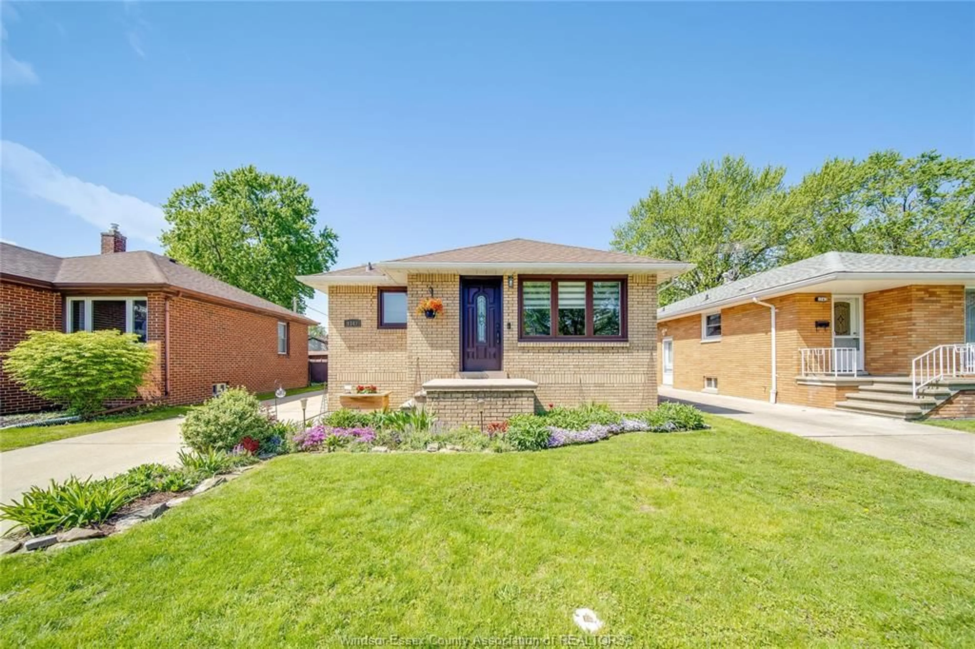 Home with brick exterior material, street for 1347 BERNARD Rd, Windsor Ontario N8Y 4K2