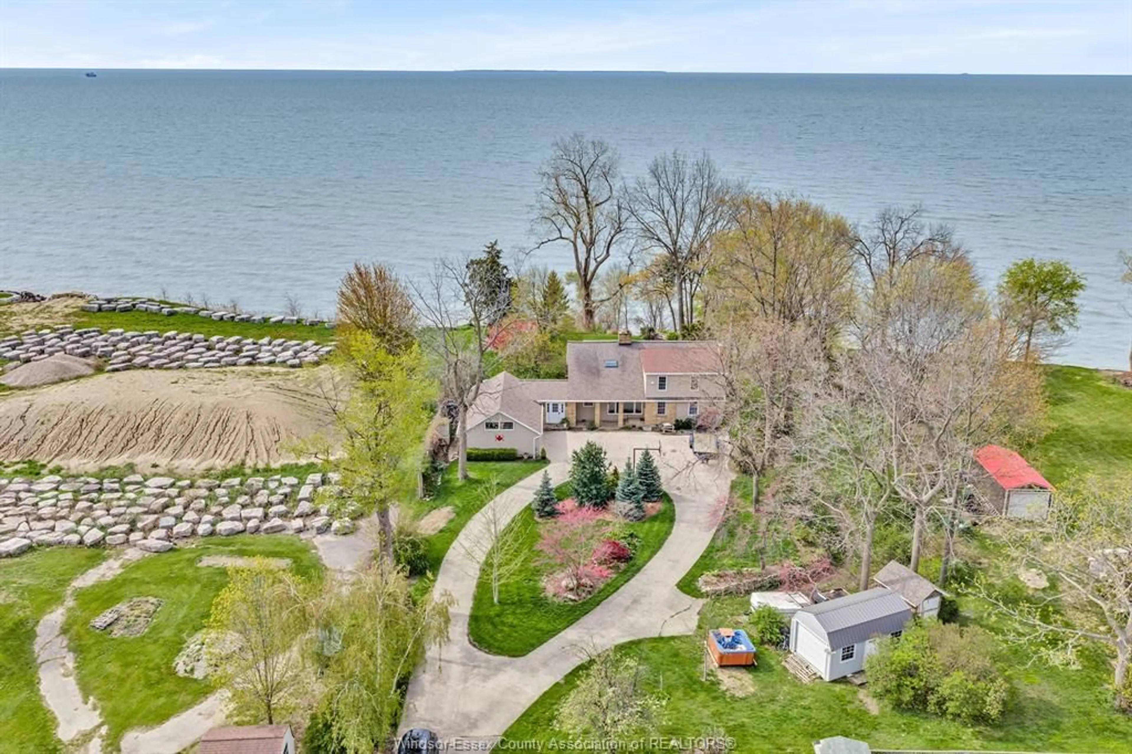 A pic from outside/outdoor area/front of a property/back of a property/a pic from drone, water/lake/river/ocean view for 388 SEACLIFF Dr, Leamington Ontario N8H 4E1