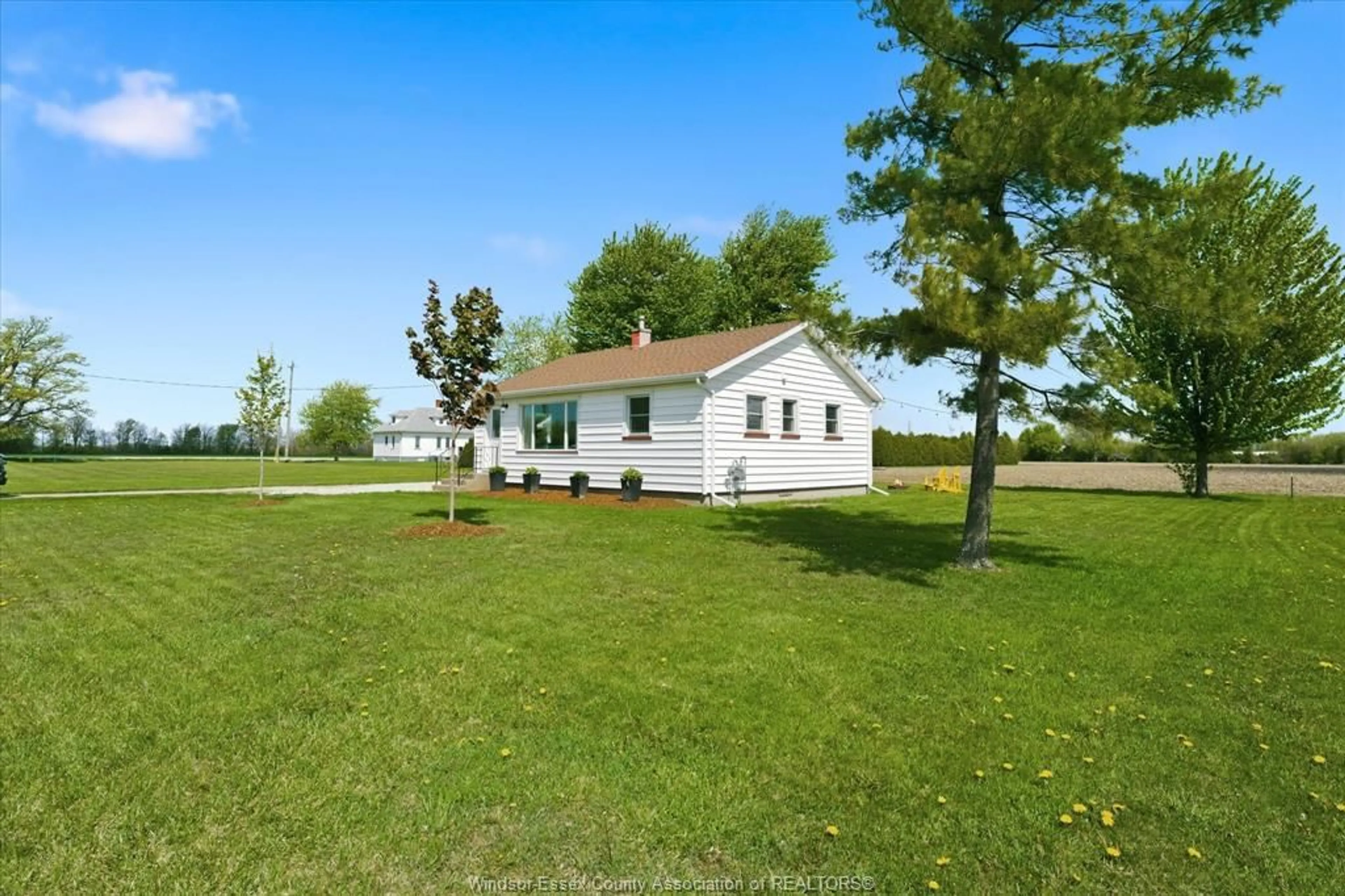 A pic from outside/outdoor area/front of a property/back of a property/a pic from drone, water/lake/river/ocean view for 461 ROAD 11, Kingsville Ontario N0R 1V0