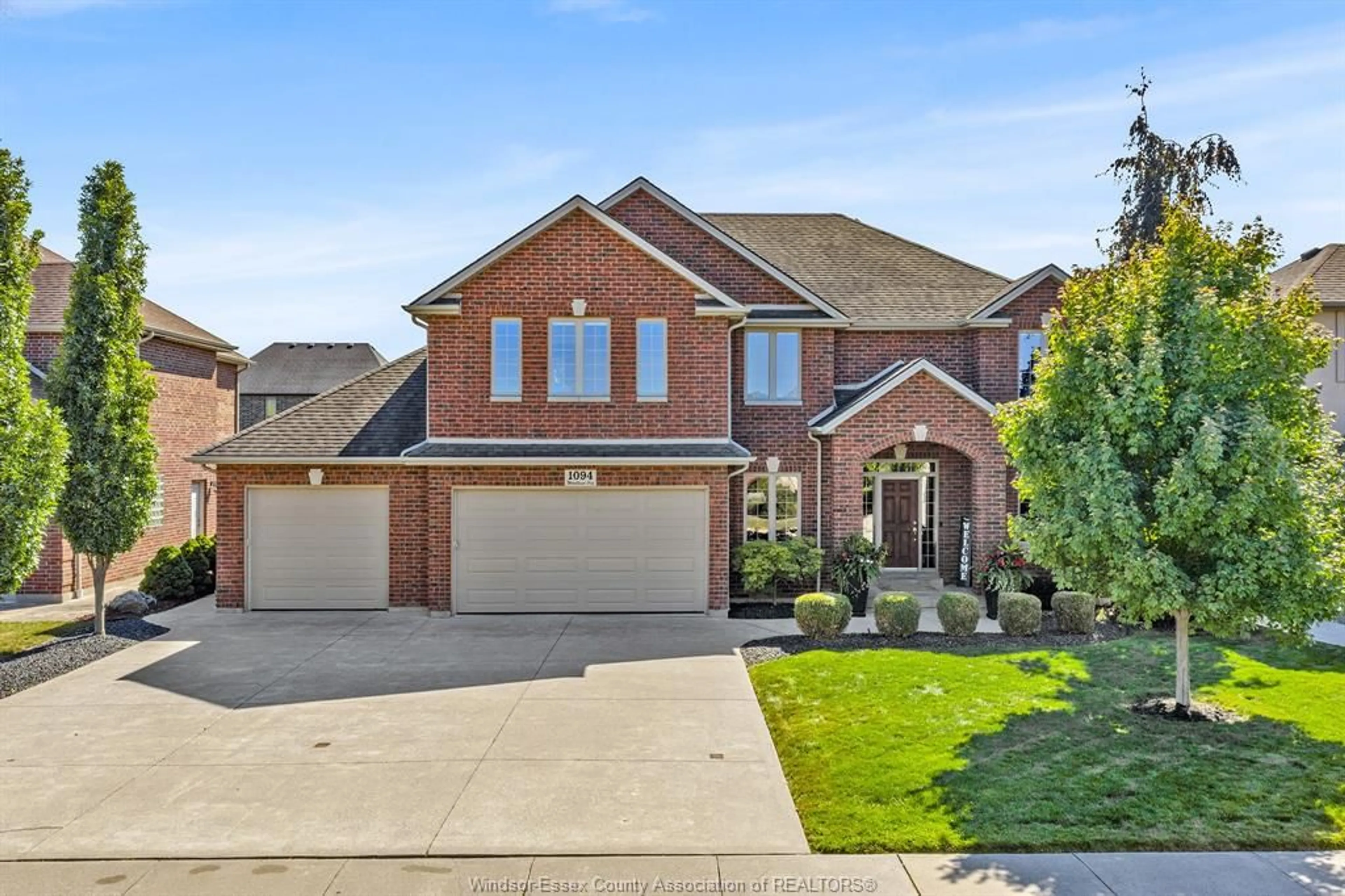 Home with brick exterior material, street for 1094 WOODLAND Cres, Lakeshore Ontario N0R 1A0
