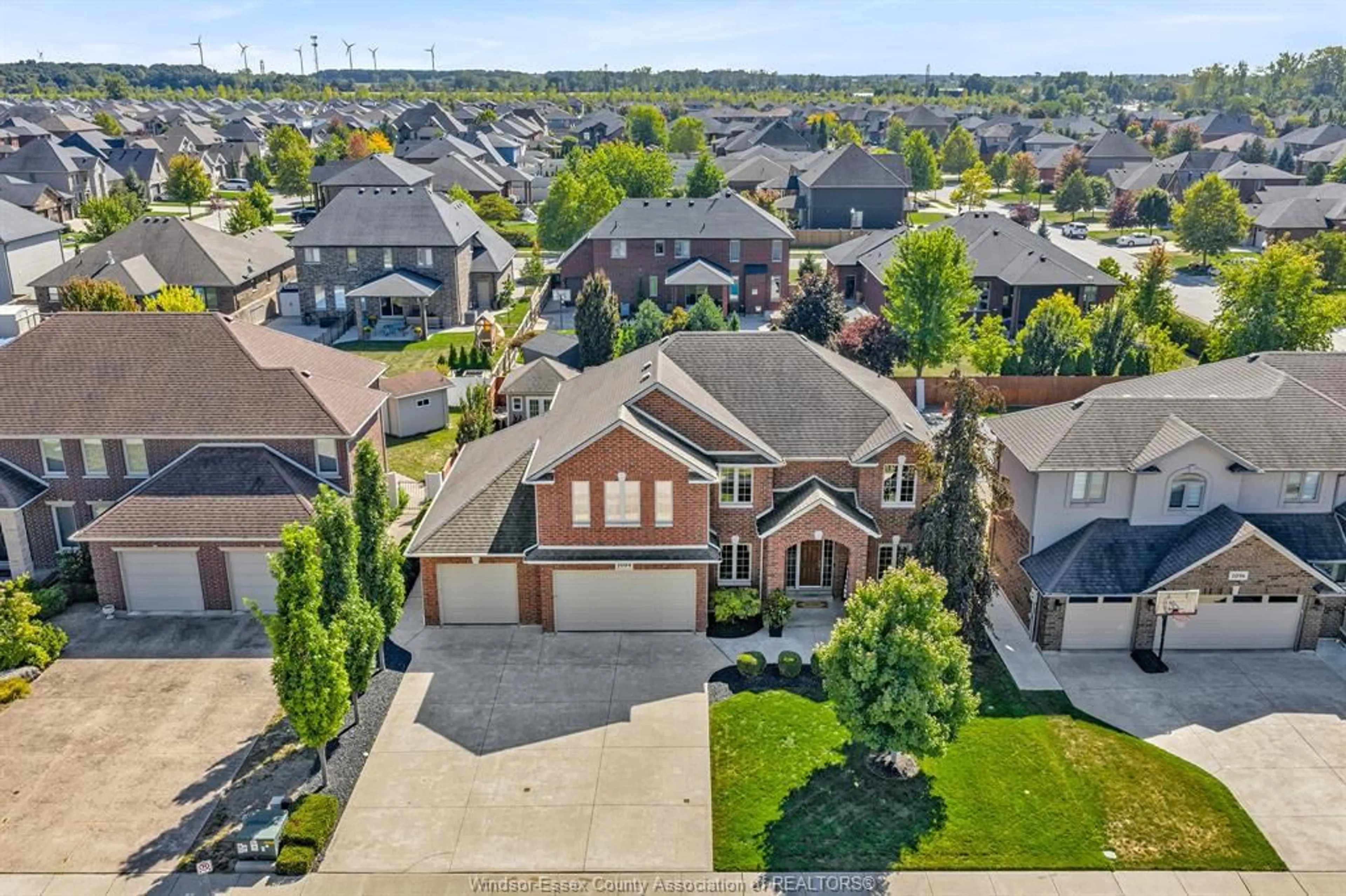 A pic from outside/outdoor area/front of a property/back of a property/a pic from drone, street for 1094 WOODLAND Cres, Lakeshore Ontario N0R 1A0