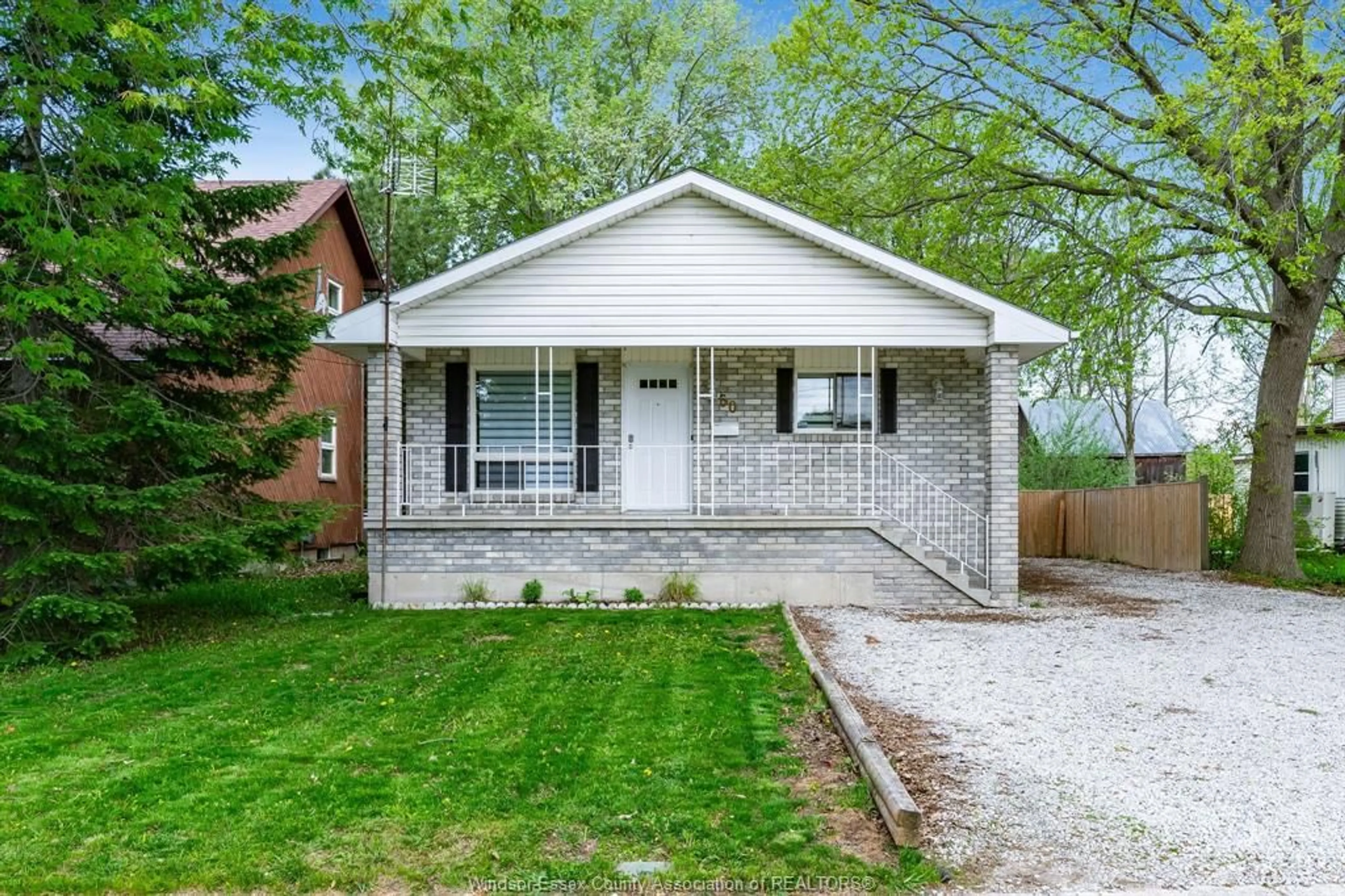 Home with brick exterior material, street for 60 Canal St, Tilbury Ontario N0P 2L0