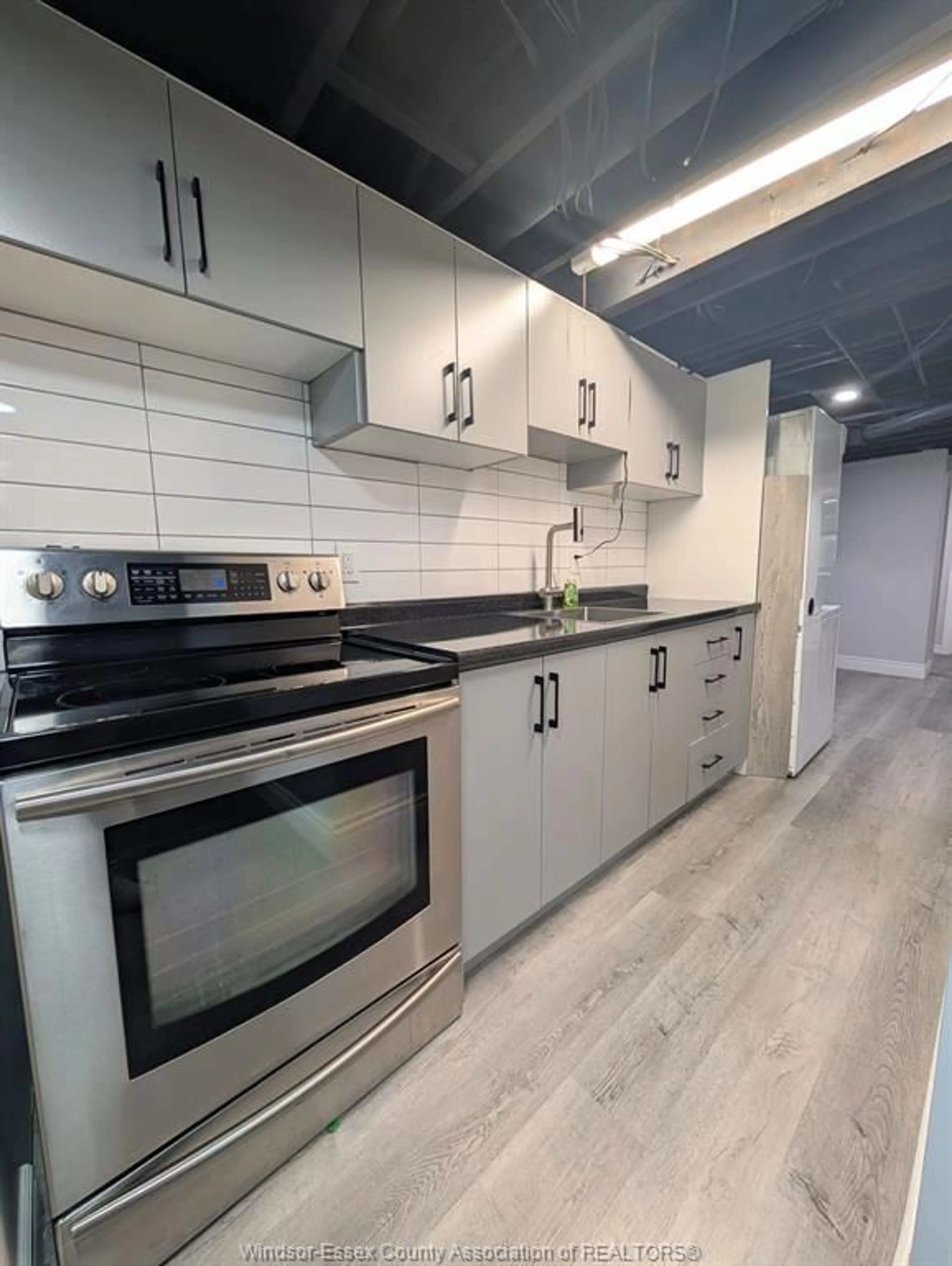 Open concept kitchen, unknown for 3456 EVERTS Ave, Windsor Ontario N9E 2W1