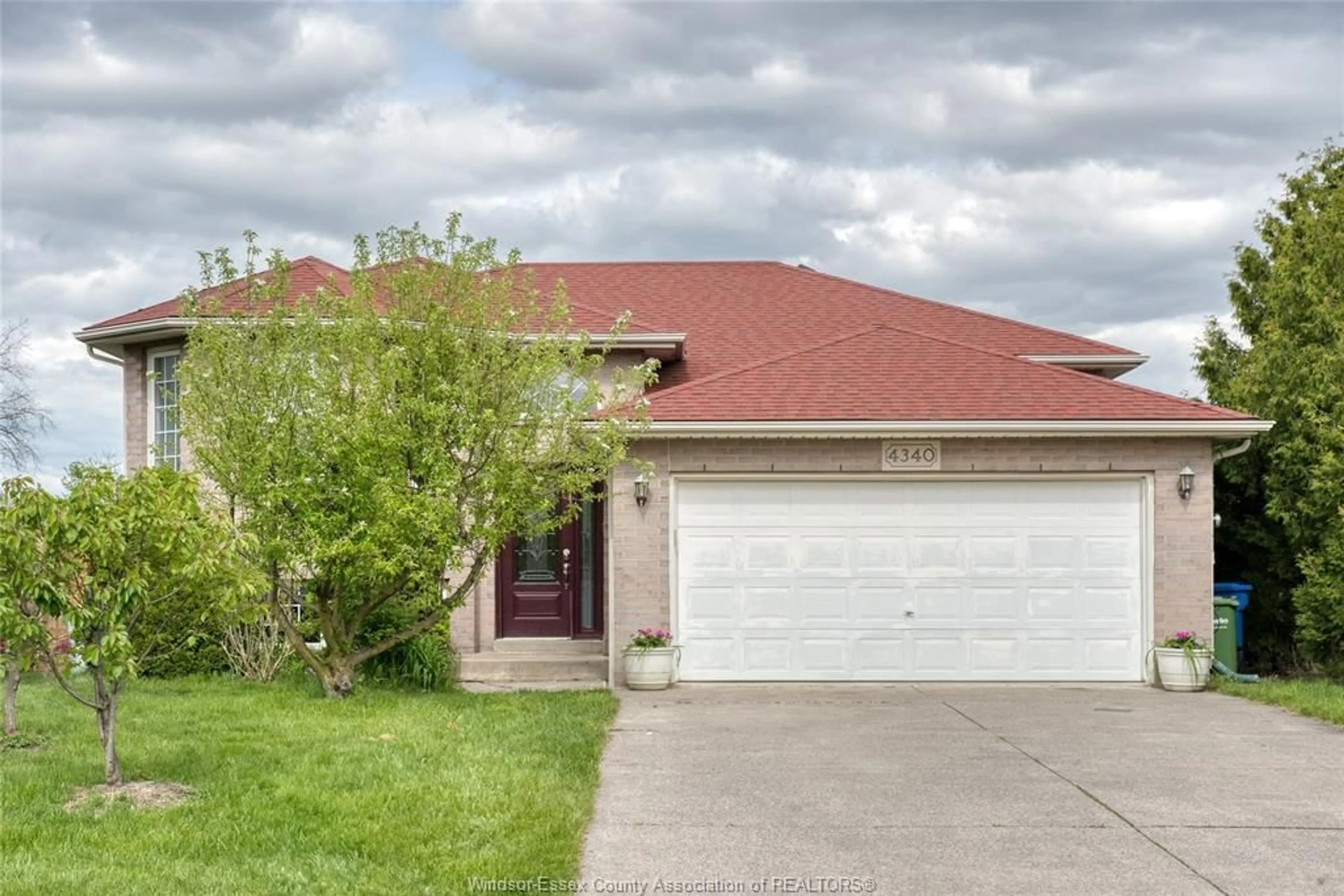 Home with brick exterior material, street for 4340 ST. CLAIR Ave, LaSalle Ontario N9H 1G1