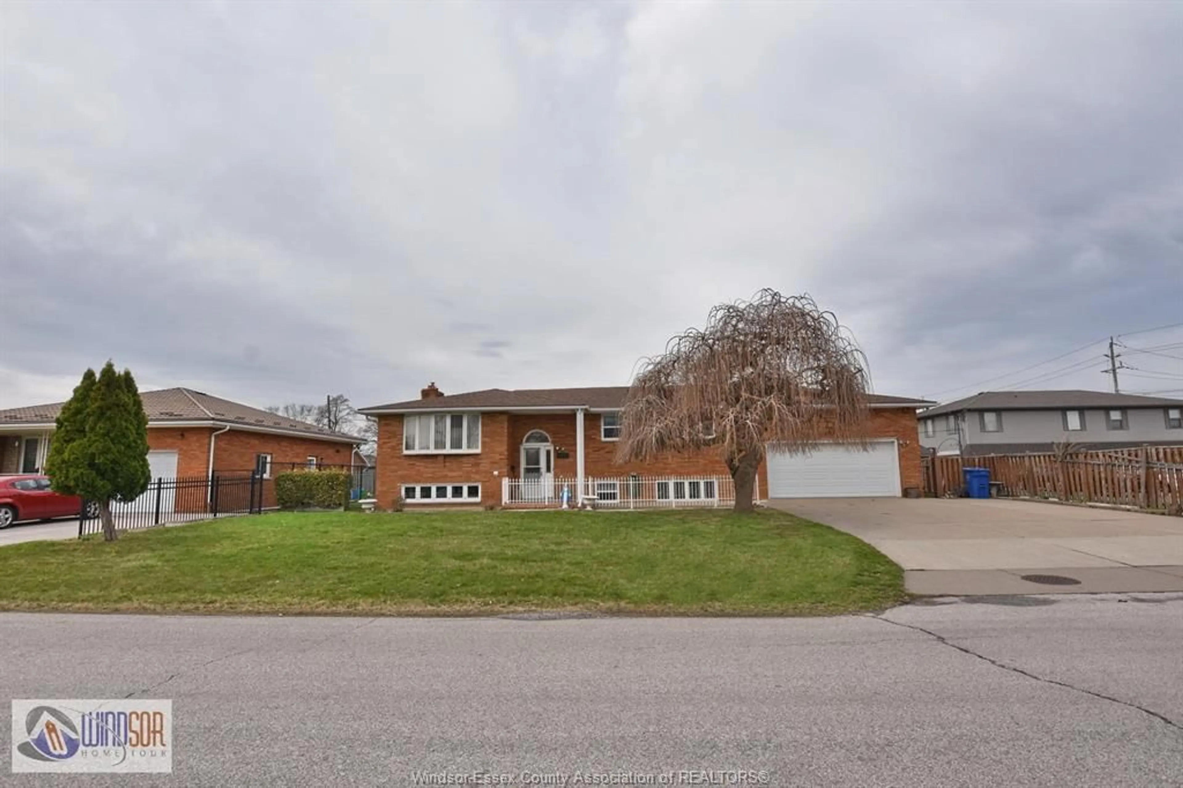 Home with brick exterior material, street for 1455 ST. CLAIR Ave, Windsor Ontario N9B 3K7