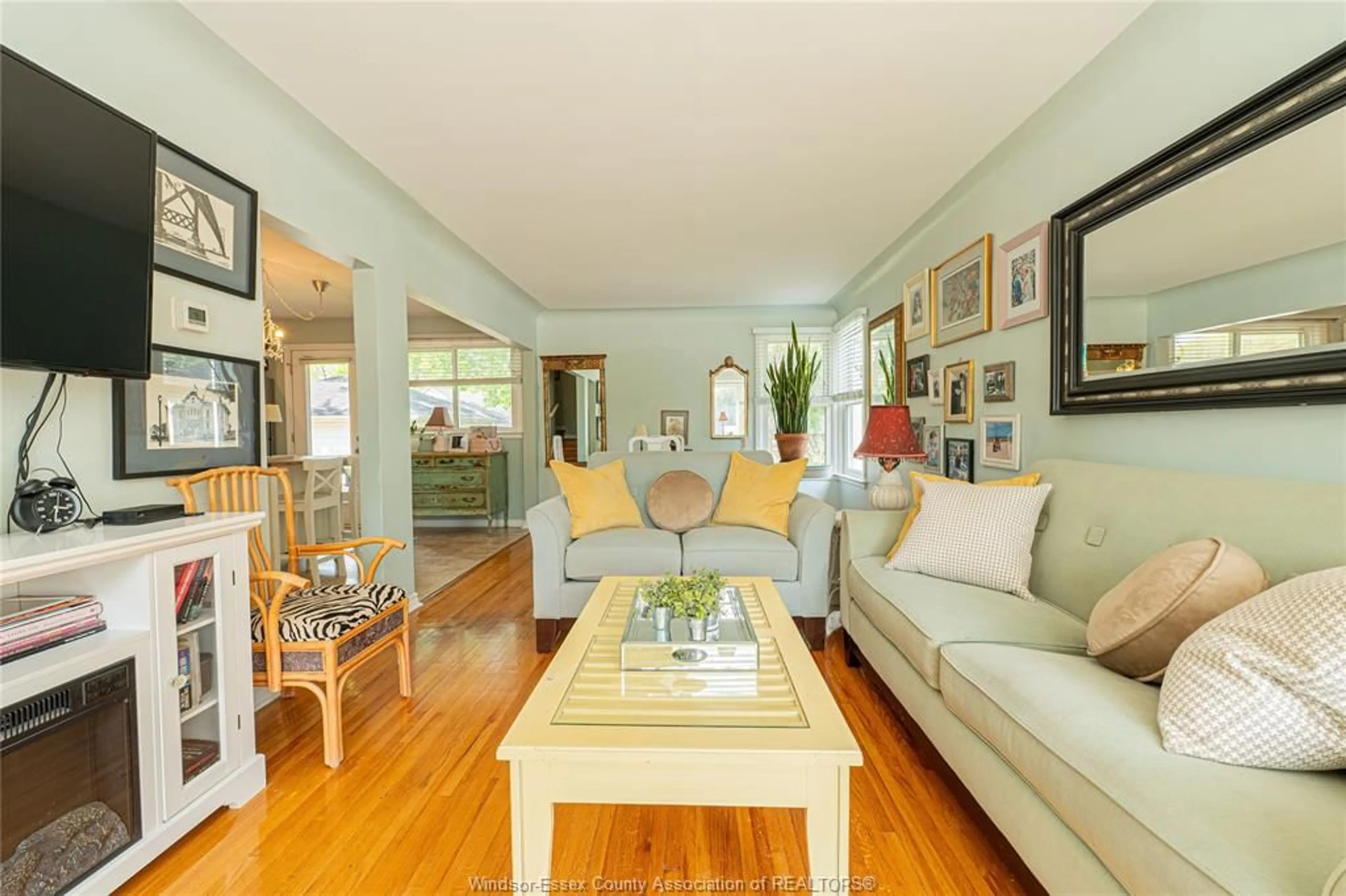 Living room with furniture, wood/laminate floor for 270 Isabelle Pl, Windsor Ontario N8S 3A6