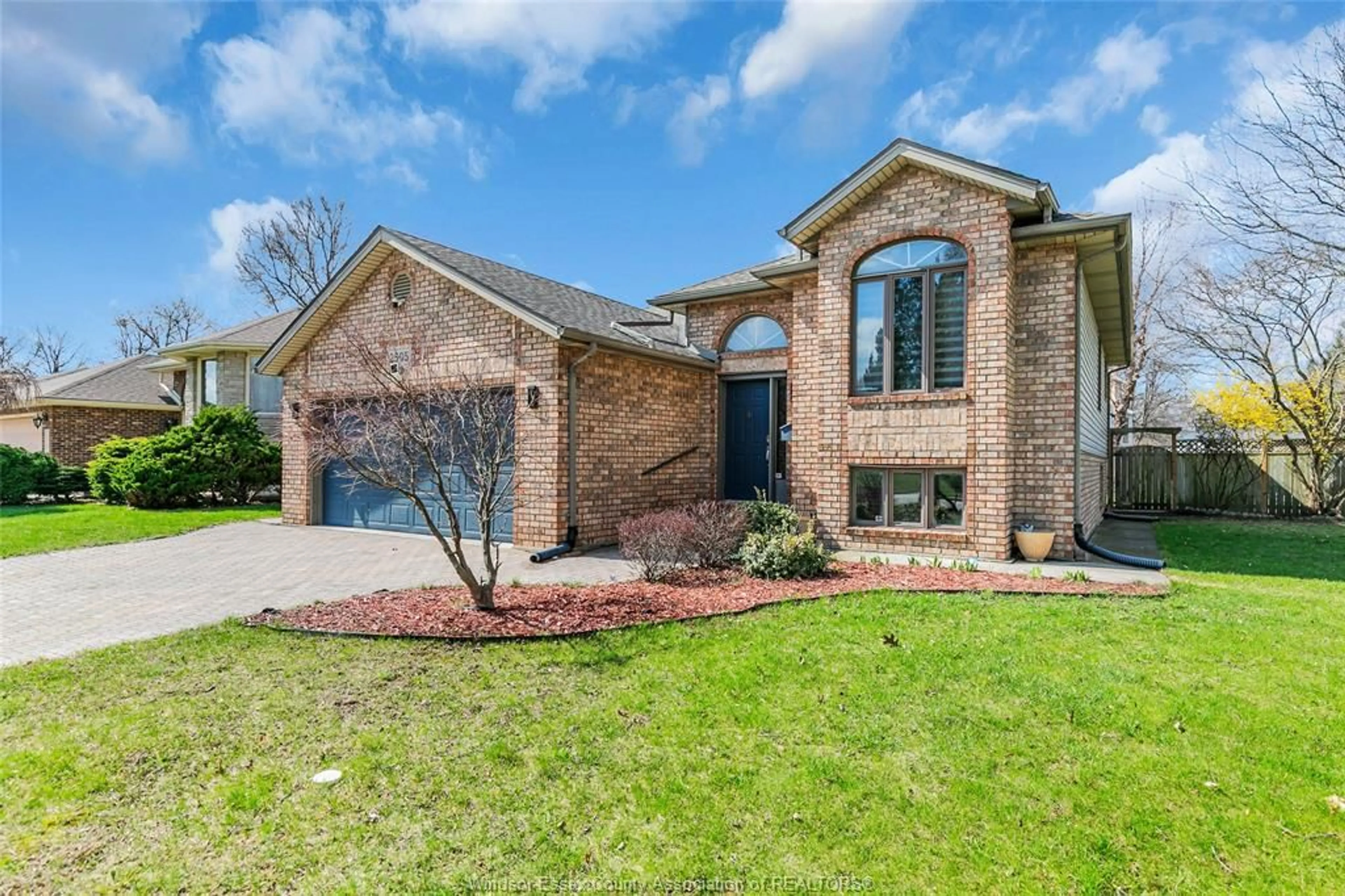 Home with brick exterior material, street for 2505 ST. CLAIR Ave, Windsor Ontario N9E 4L9