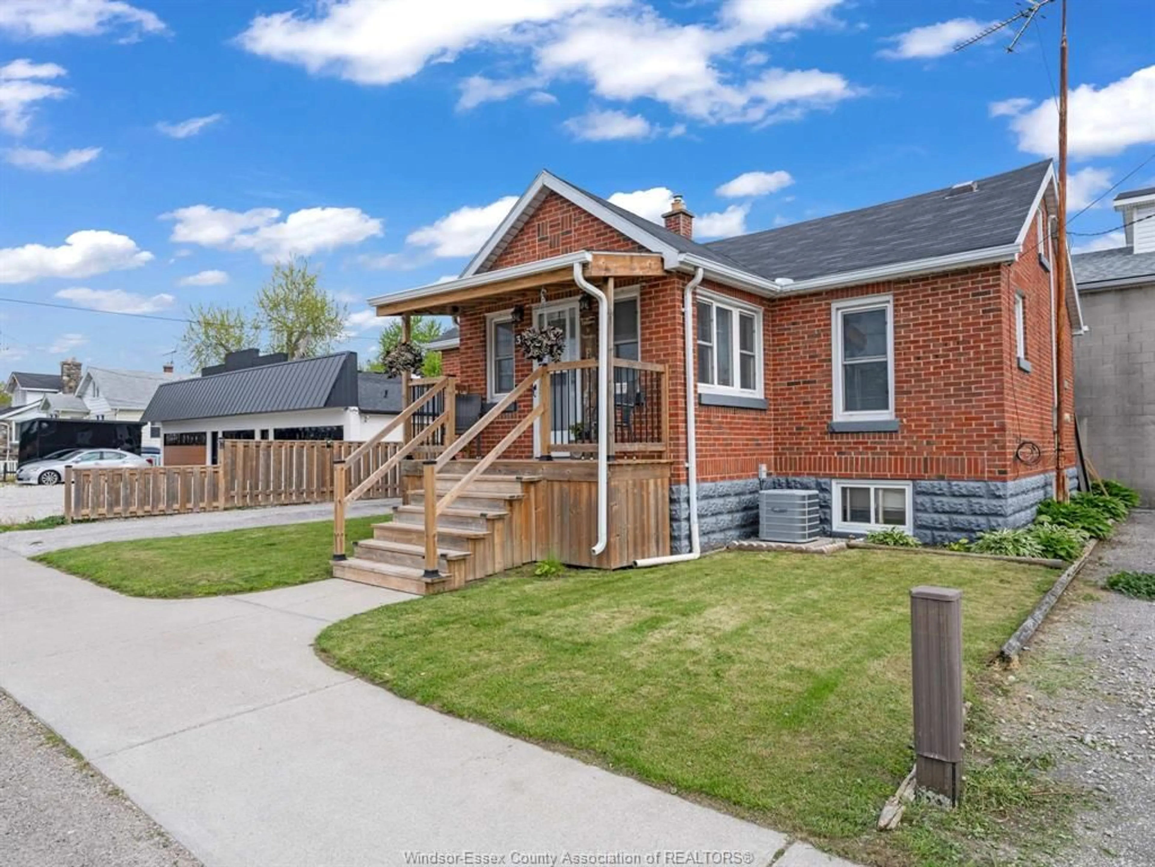 Home with brick exterior material, street for 32 Centre St, Harrow Ontario N0R 1G0