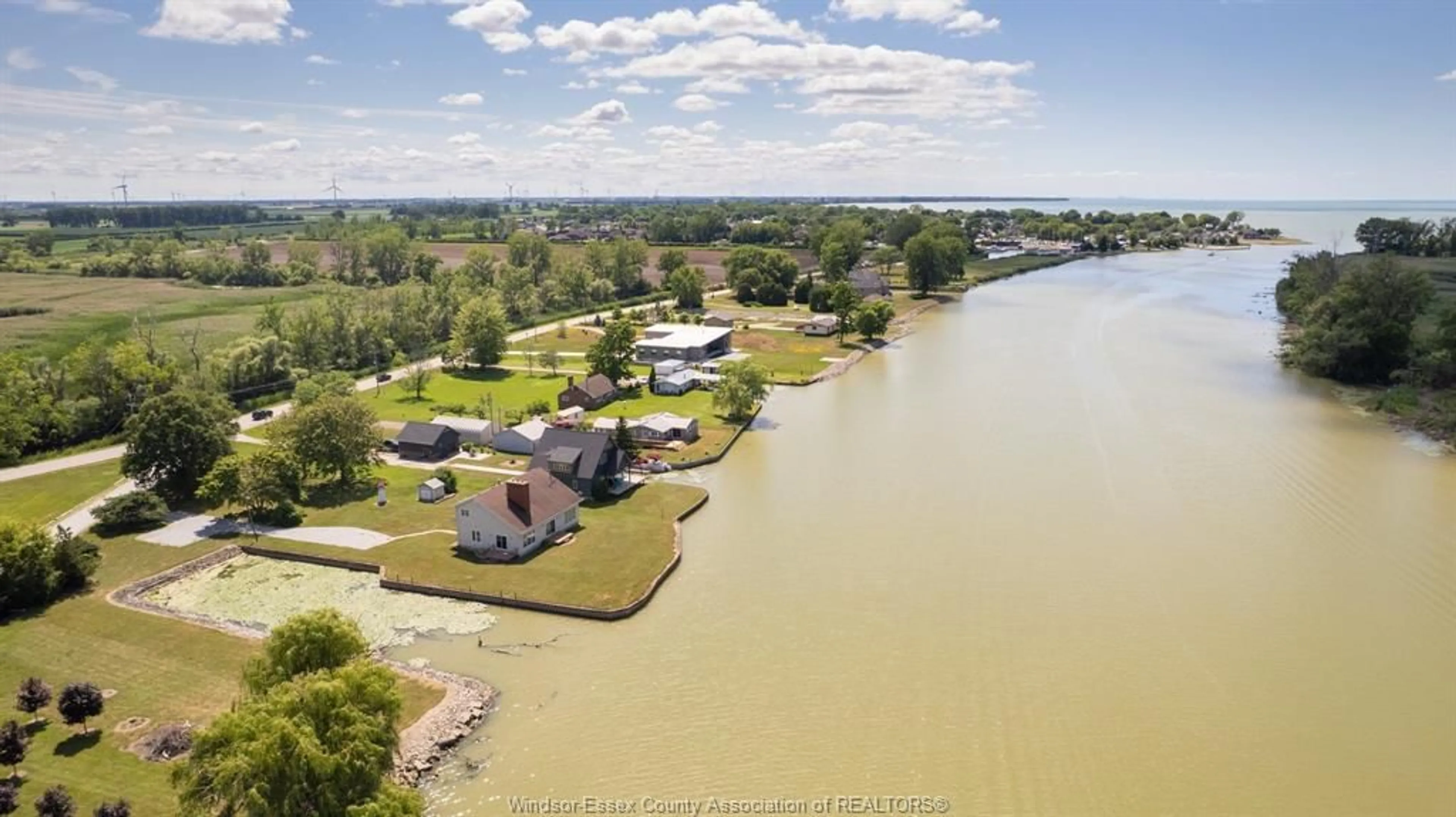 A pic from outside/outdoor area/front of a property/back of a property/a pic from drone, water/lake/river/ocean view for 21240 DOCKSIDE, Tilbury North Ontario N0P 1L0