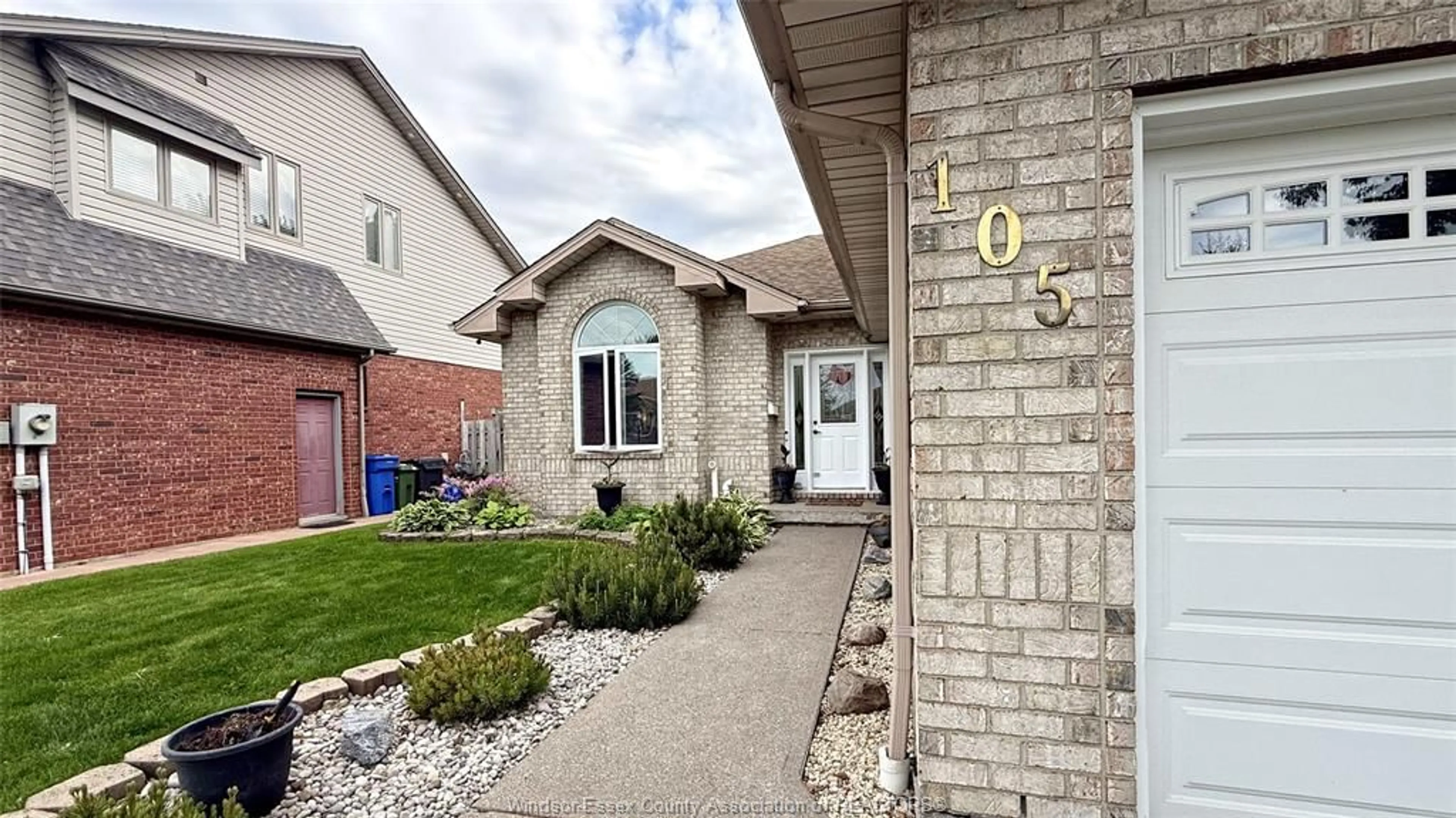 Home with brick exterior material, street for 105 MOUSSEAU Cres, Belle River Ontario N8L 0M5