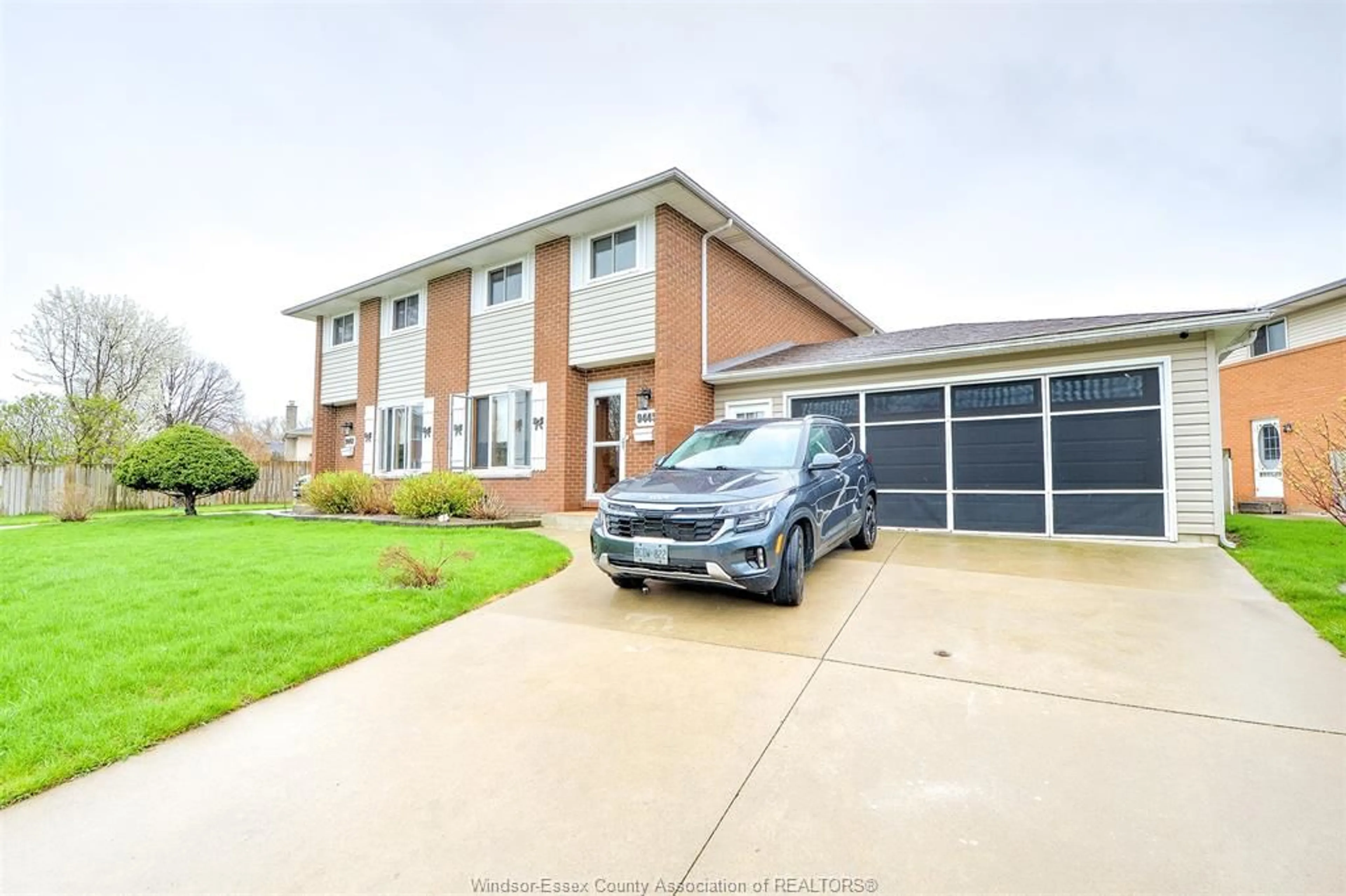 A pic from outside/outdoor area/front of a property/back of a property/a pic from drone, street for 9445 ALTEN Dr, Windsor Ontario N8R 1V9