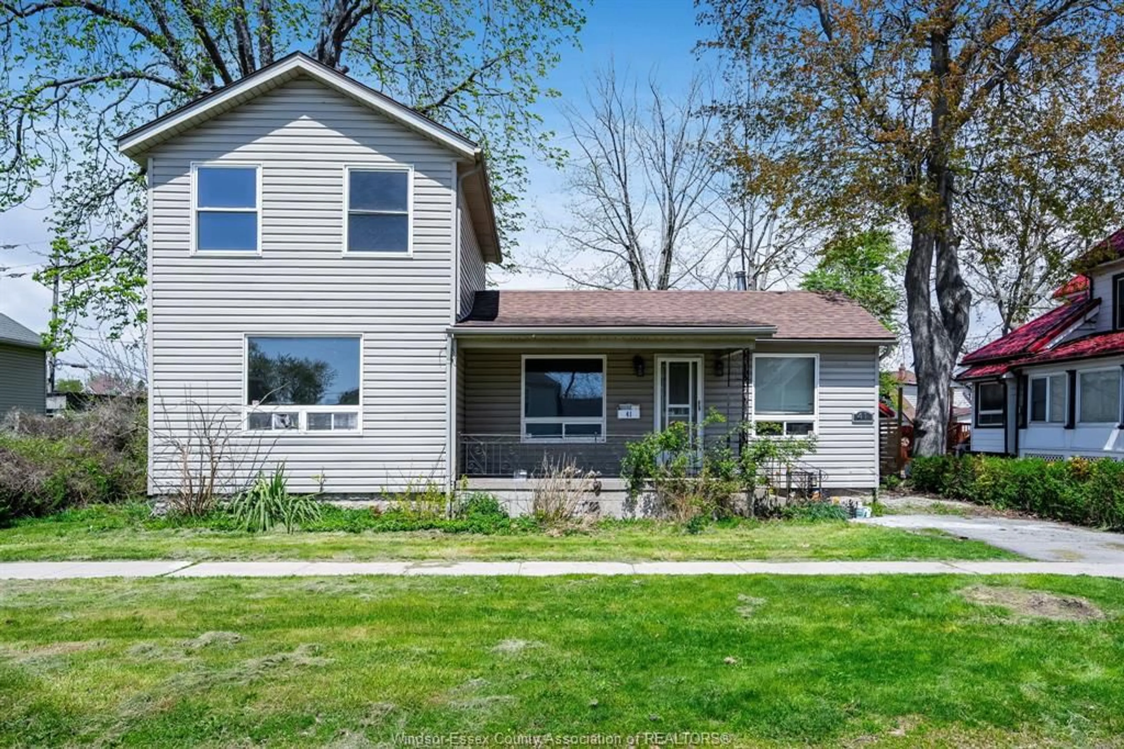 Home with vinyl exterior material, street for 41 Orange St, Leamington Ontario N8H 1P6