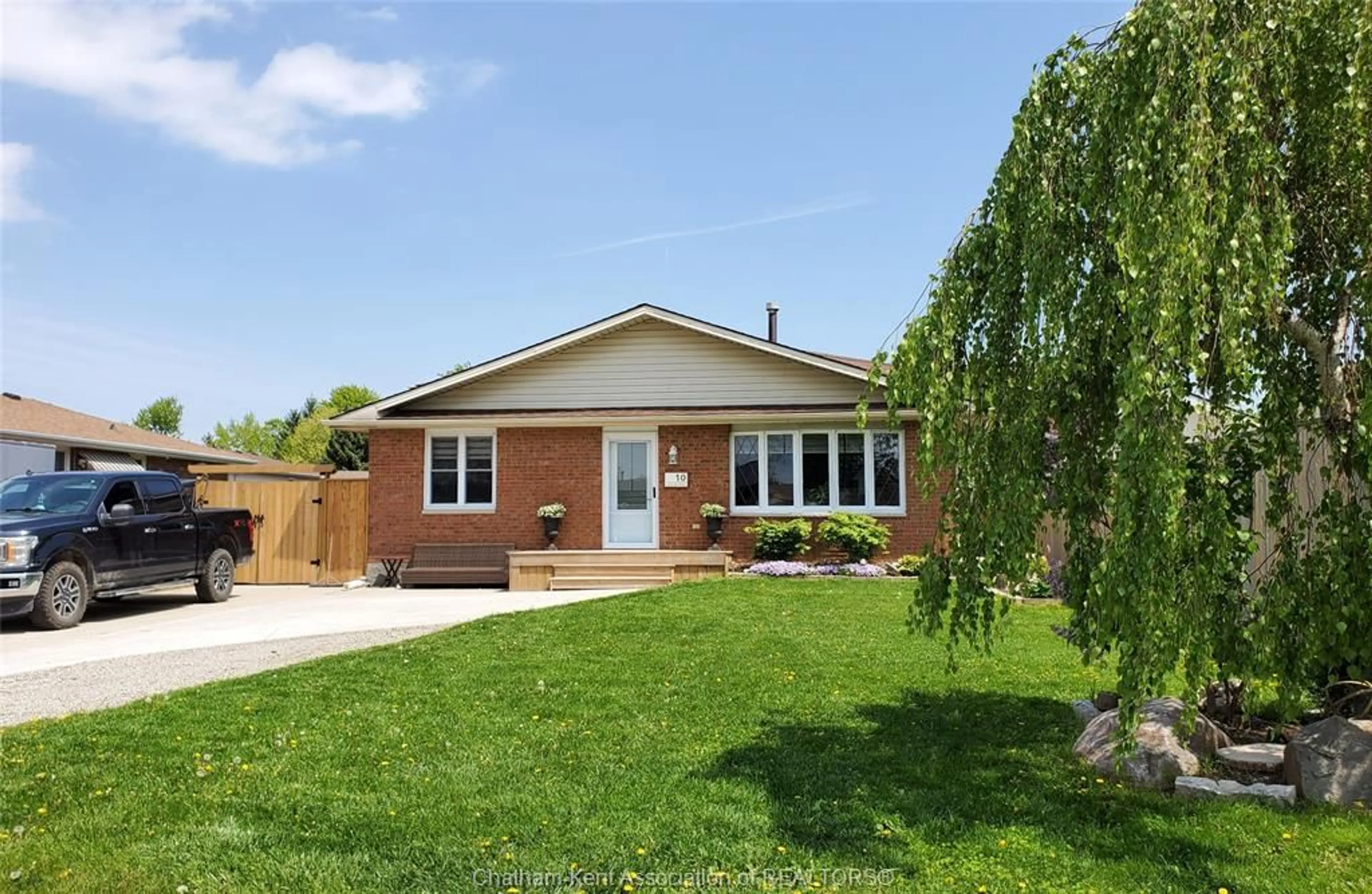Home with brick exterior material, street for 10 Athlone Rd, Tilbury Ontario N0P 2L0