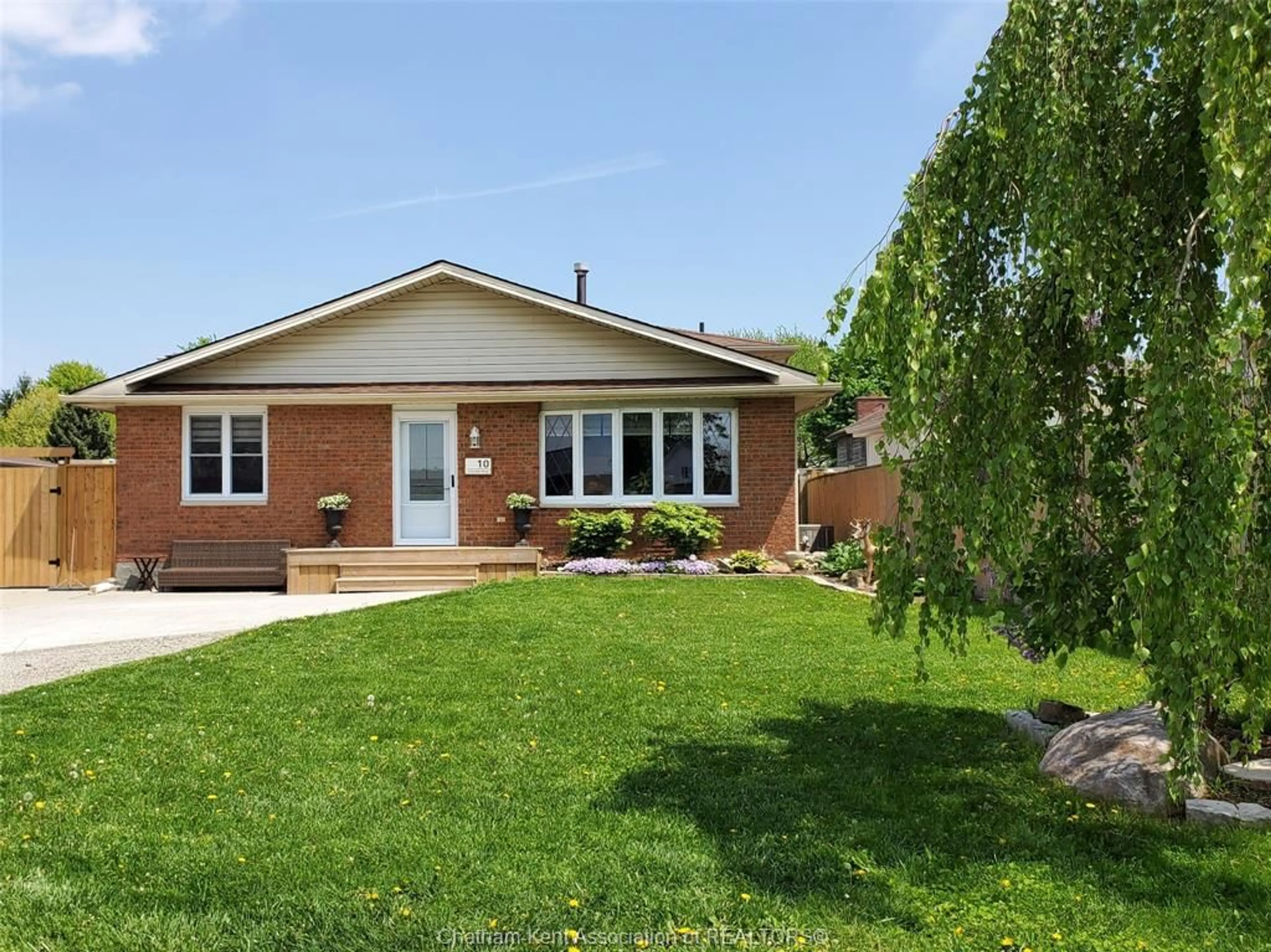Home with brick exterior material, street for 10 Athlone Rd, Tilbury Ontario N0P 2L0