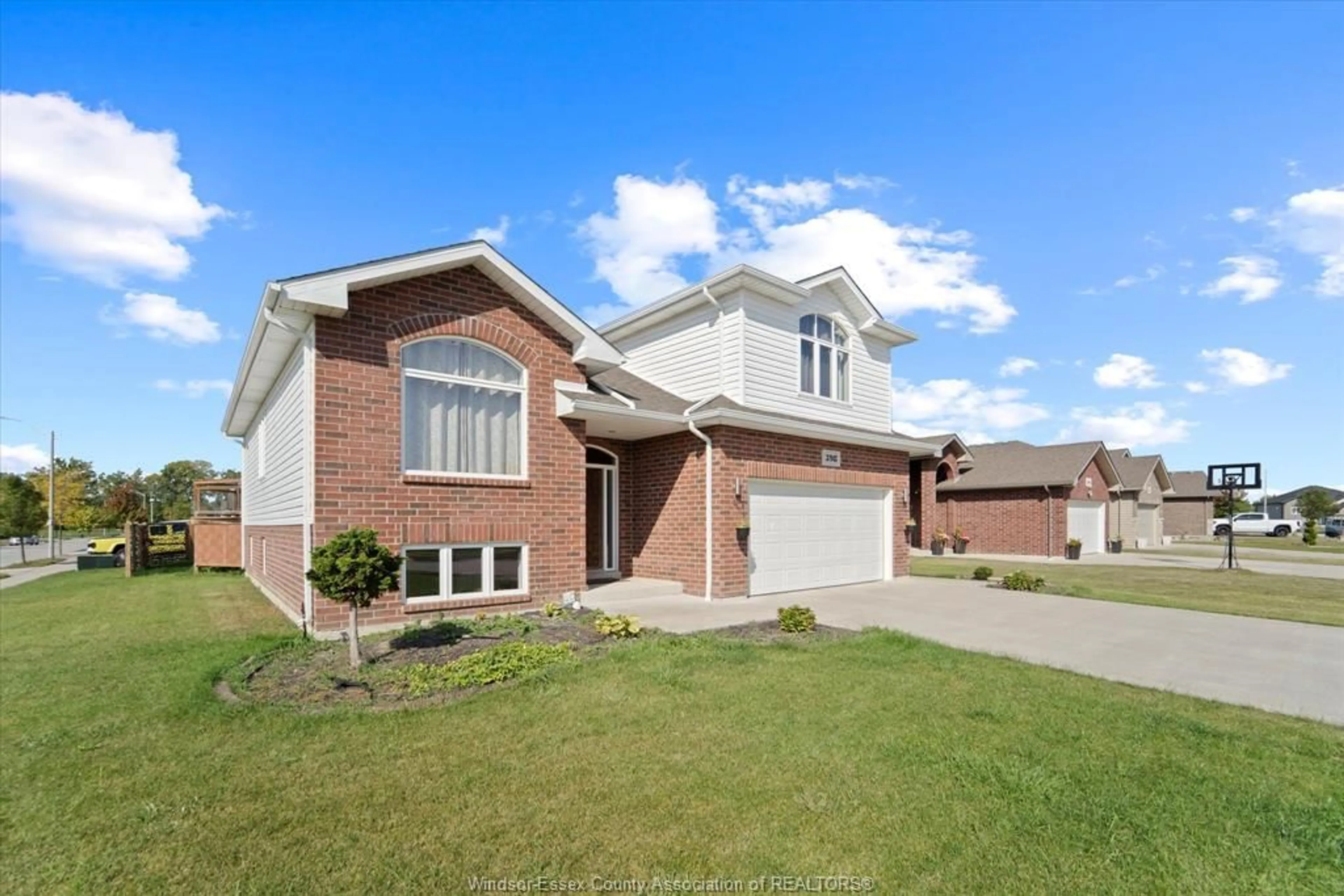 Home with brick exterior material, street for 398 Poplar, Belle River Ontario N8L 0X7
