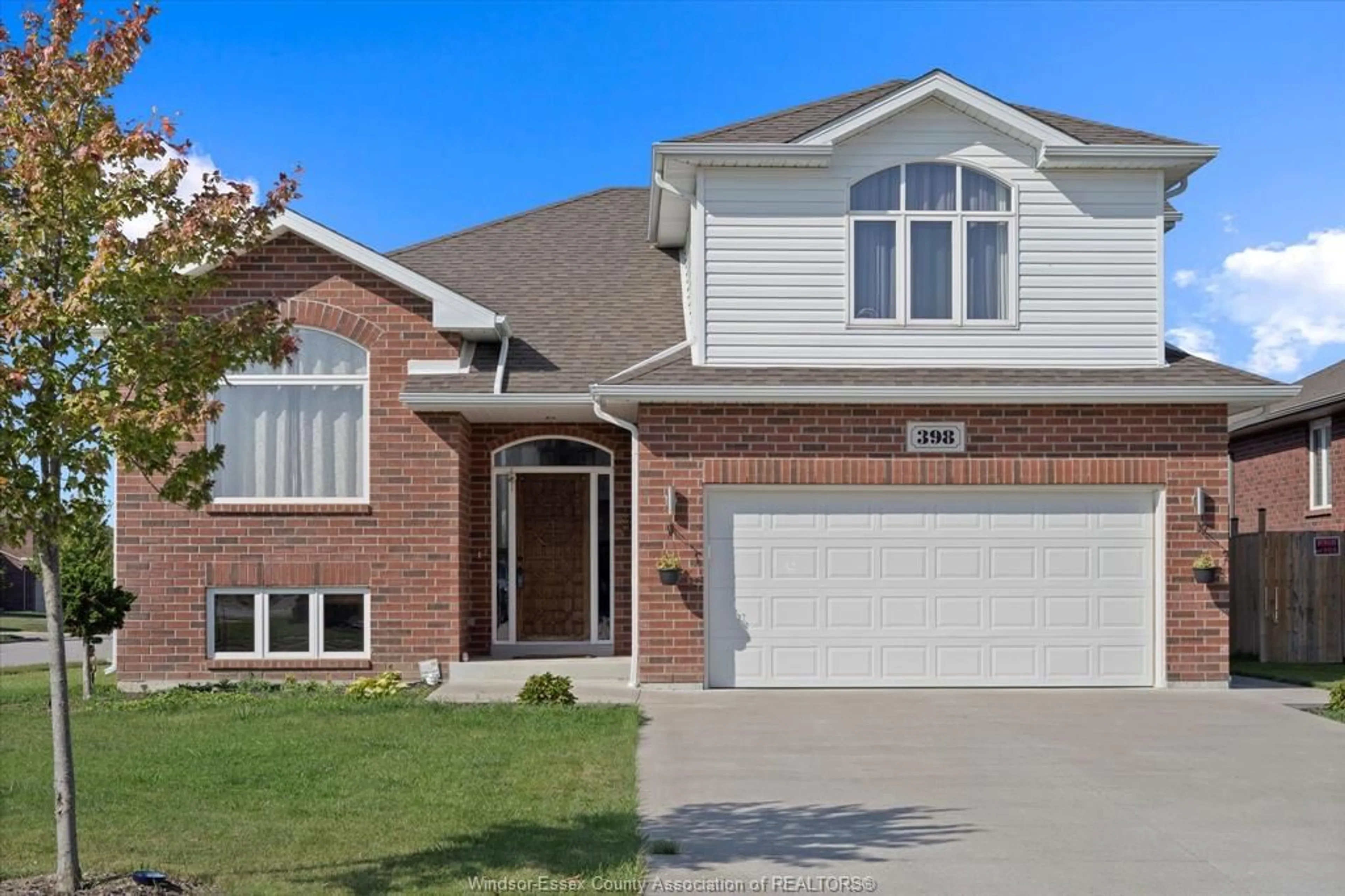 Home with brick exterior material, street for 398 Poplar, Belle River Ontario N8L 0X7