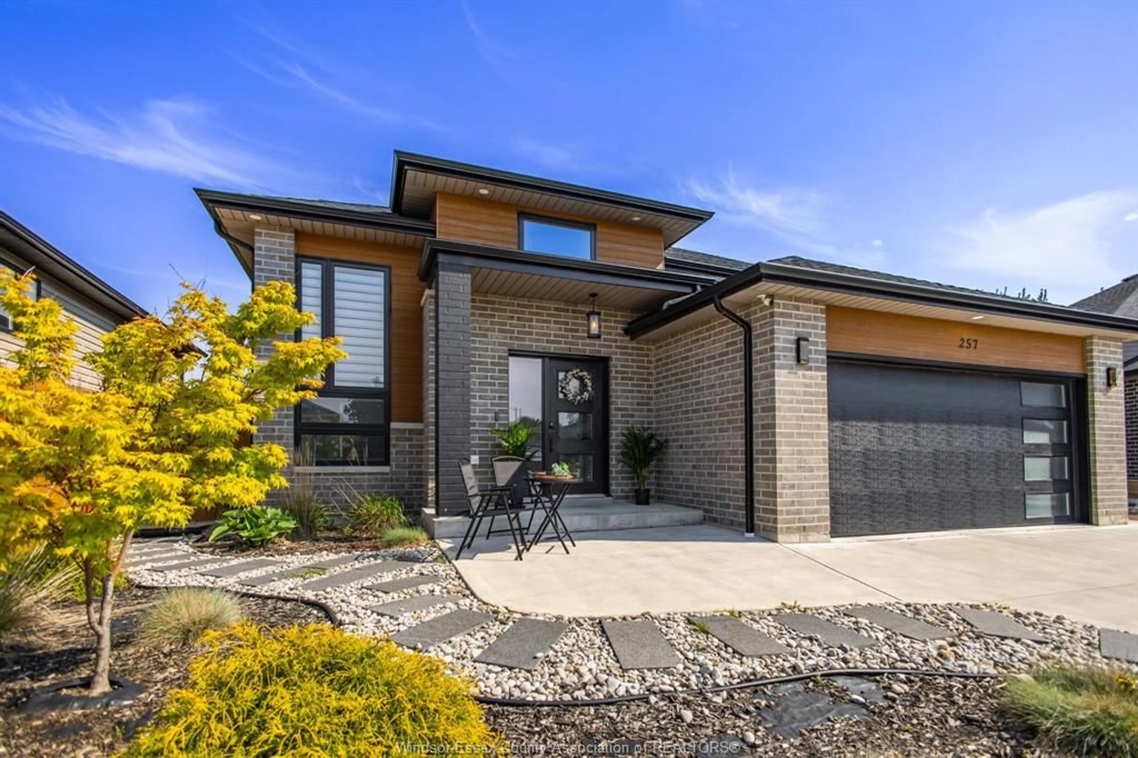 Home with brick exterior material, street for 257 ROBINSON Ave, Essex Ontario N8M 0A8