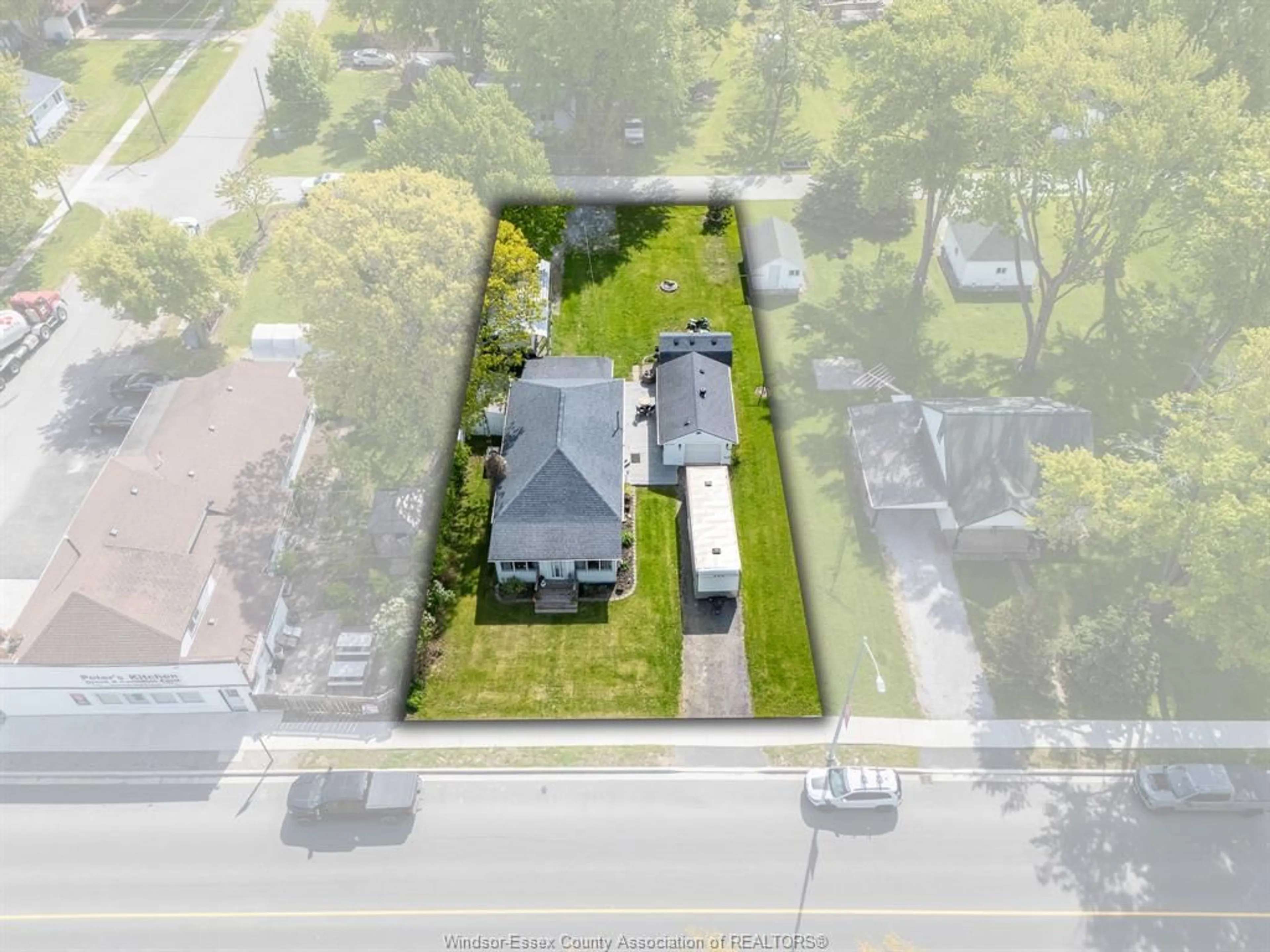 A pic from outside/outdoor area/front of a property/back of a property/a pic from drone, street for 6504 Main Street, Lakeshore Ontario N0P 1J0