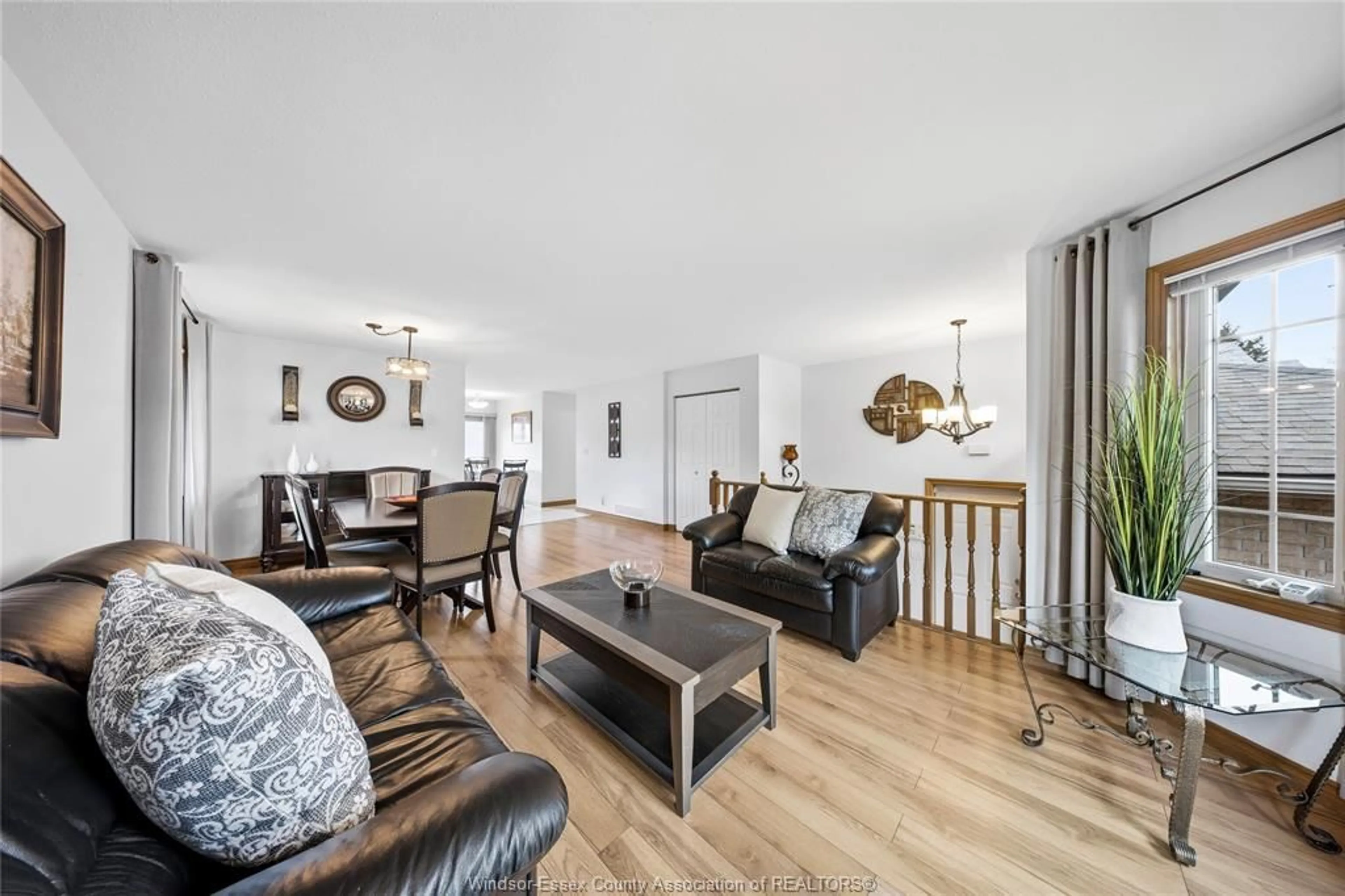 Living room with furniture, wood/laminate floor for 1978 FULLER Cres, Windsor Ontario N8W 5S2