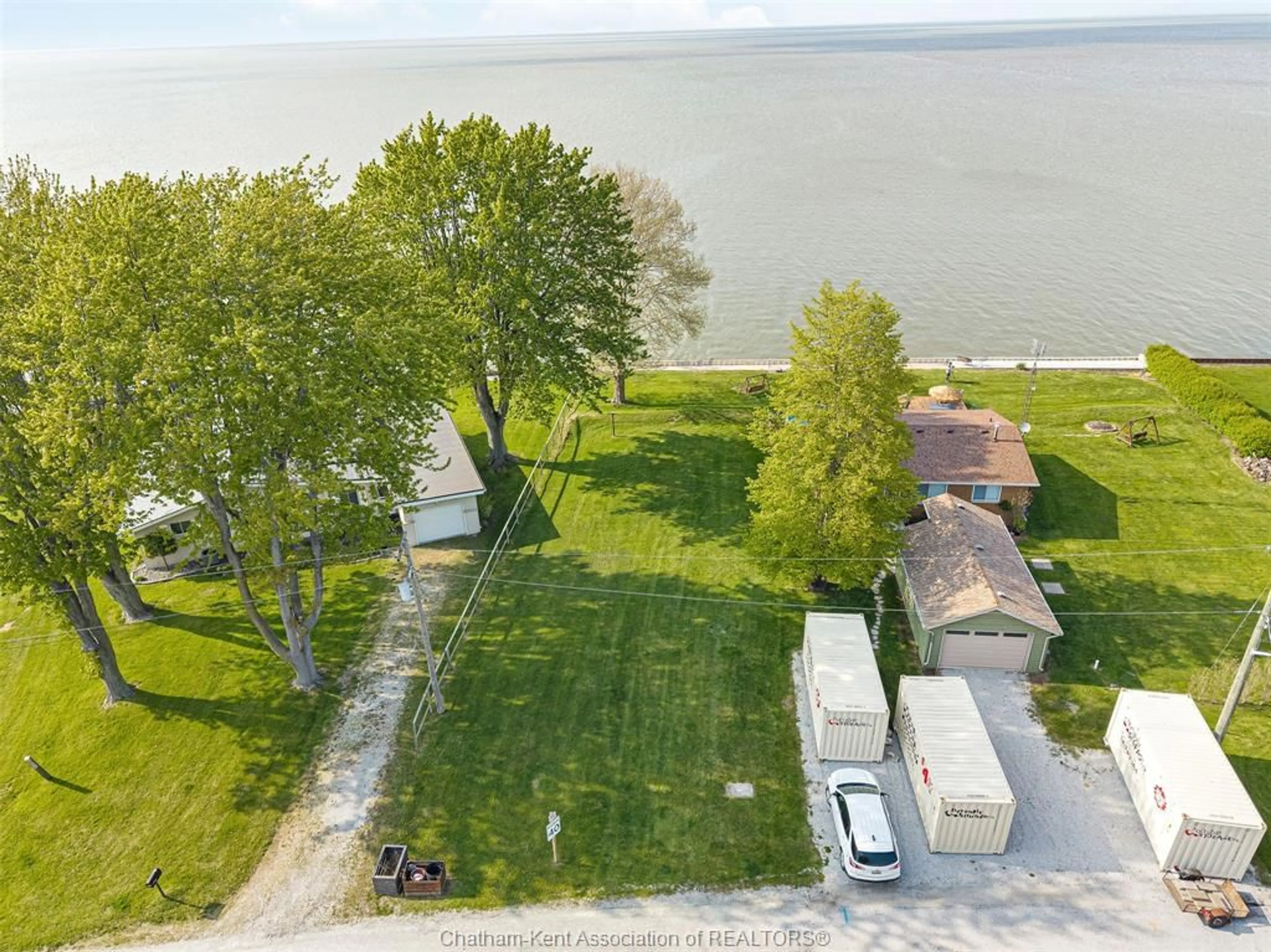 A pic from outside/outdoor area/front of a property/back of a property/a pic from drone, water/lake/river/ocean view for 105 ISLAND Cres, Lighthouse Cove Ontario N0P 2L0