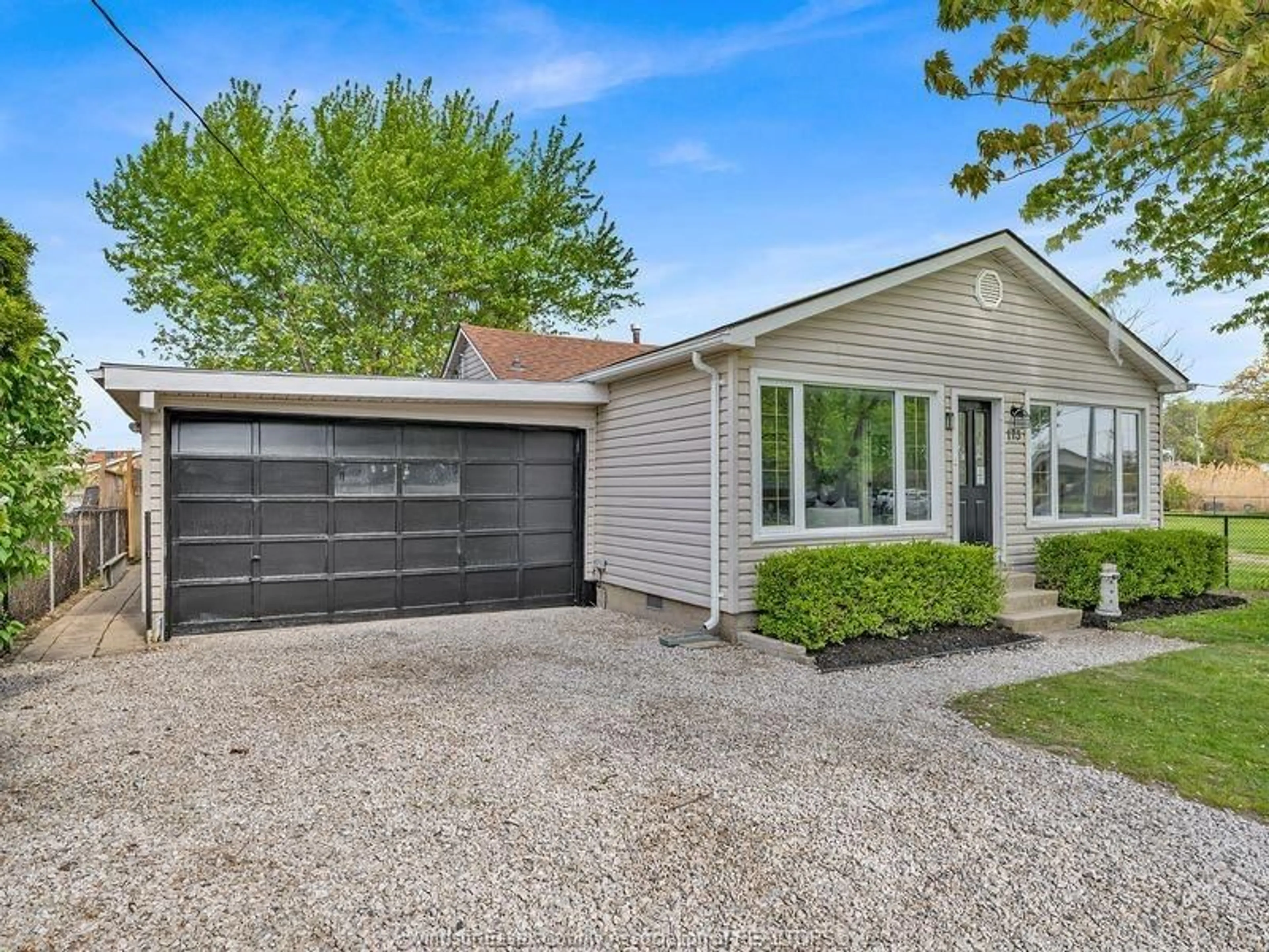 Home with vinyl exterior material, street for 173 MILL St, Lakeshore Ontario N8L 0Y9