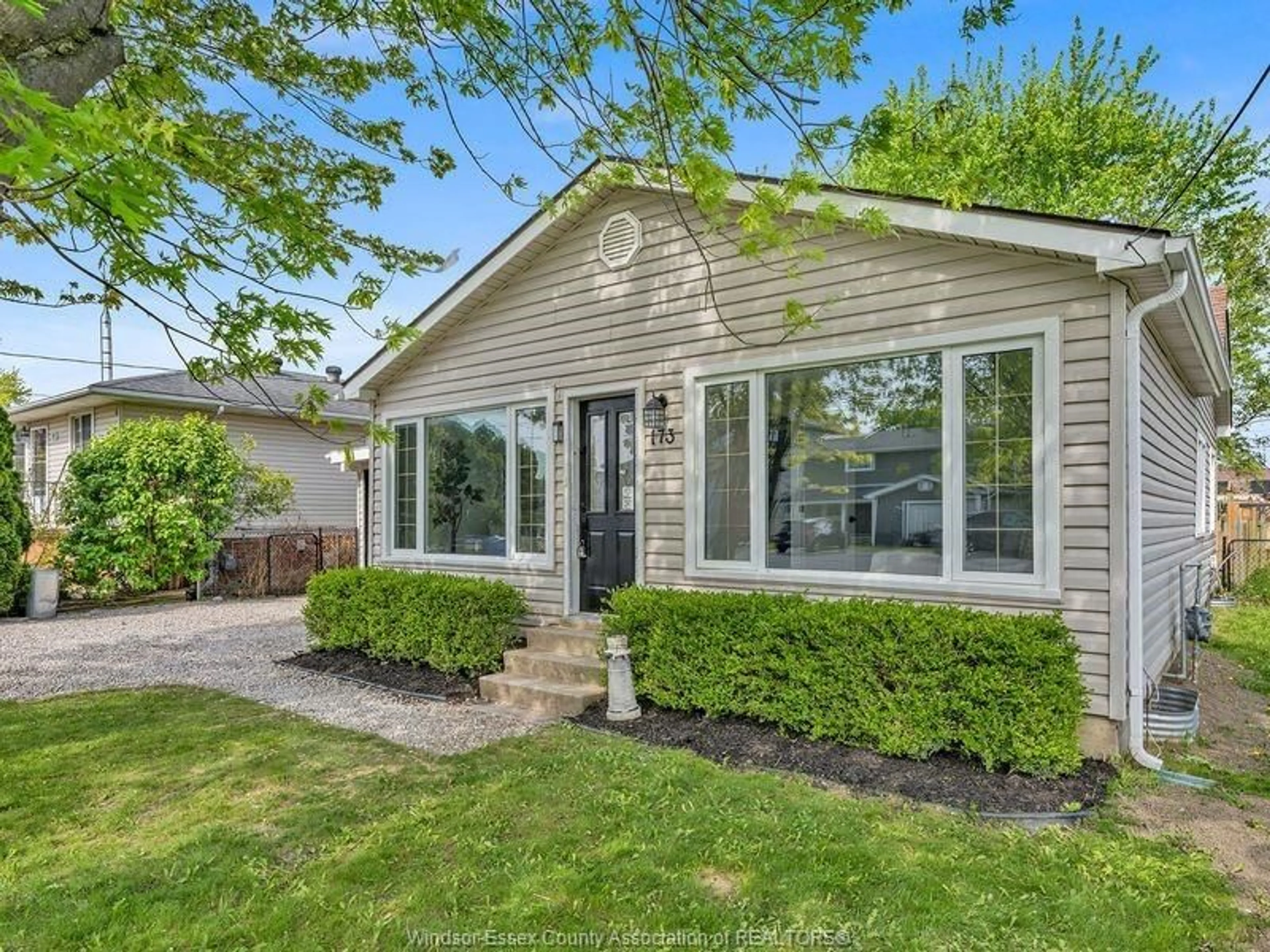 Home with vinyl exterior material, street for 173 MILL St, Lakeshore Ontario N8L 0Y9