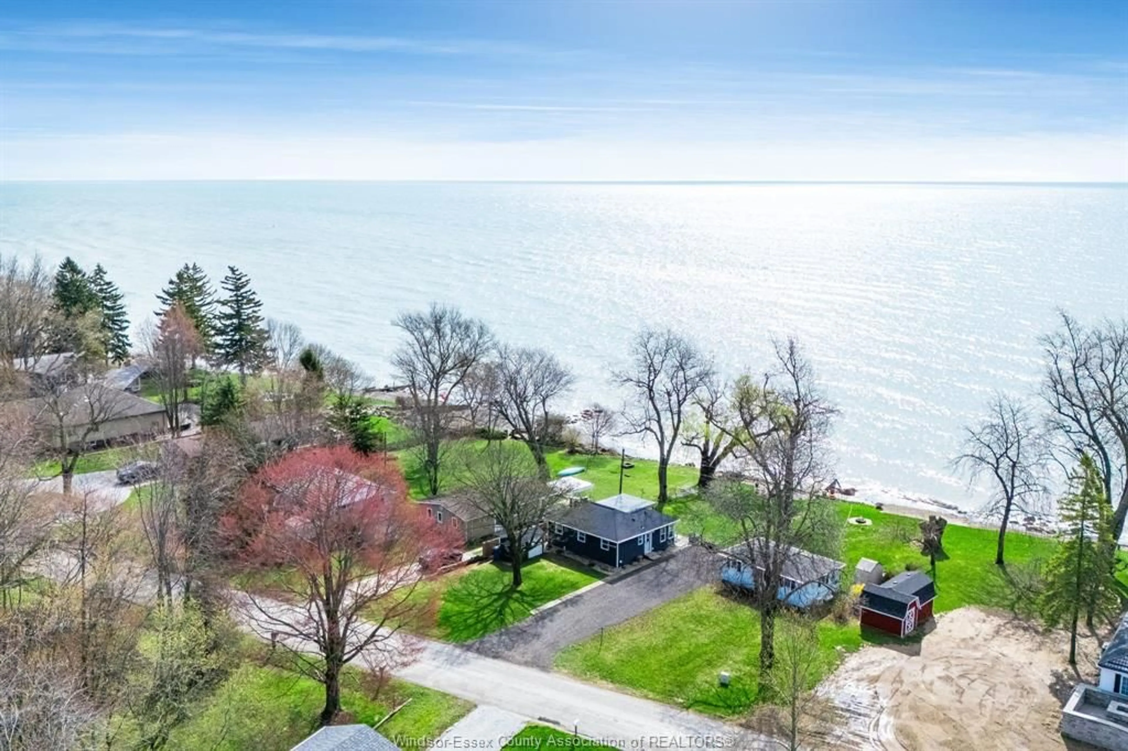 A pic from outside/outdoor area/front of a property/back of a property/a pic from drone, water/lake/river/ocean view for 306 Detroit Line, Wheatley Ontario N0P 2P0