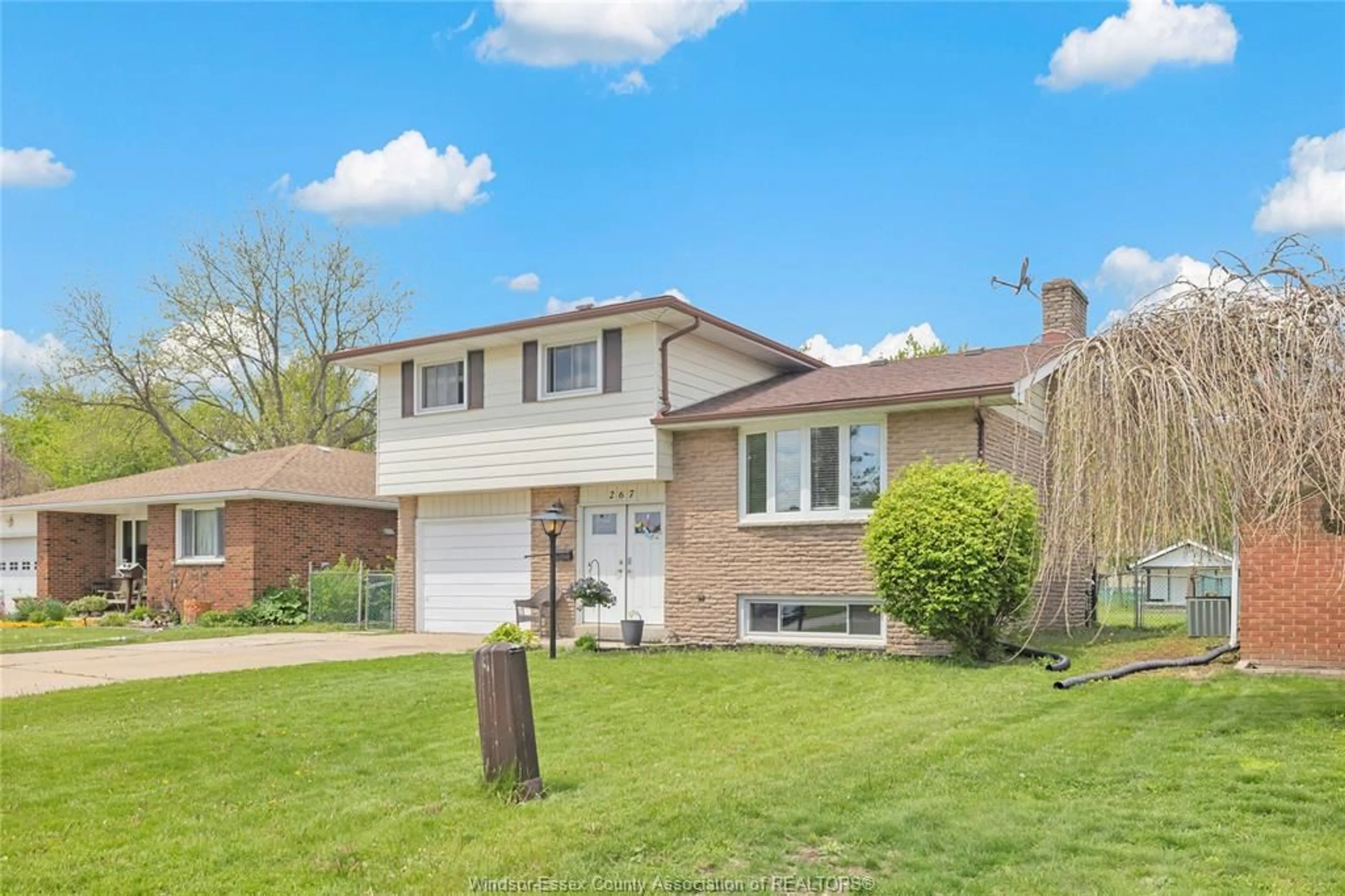 Home with brick exterior material, street for 267 ILER St, Essex Ontario N8M 1T9
