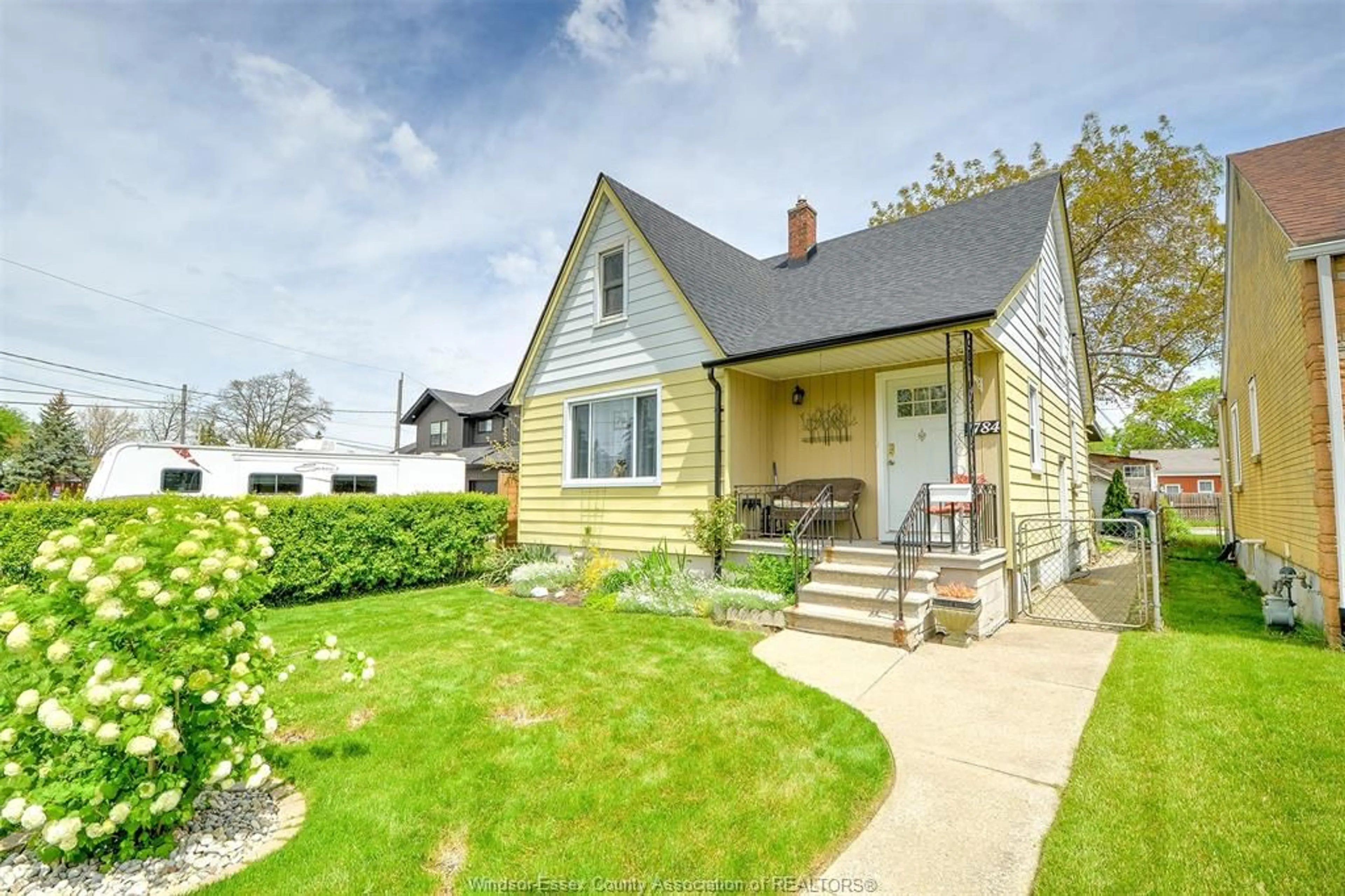 Home with vinyl exterior material, street for 1784 PIERRE Ave, Windsor Ontario N8W 2J6