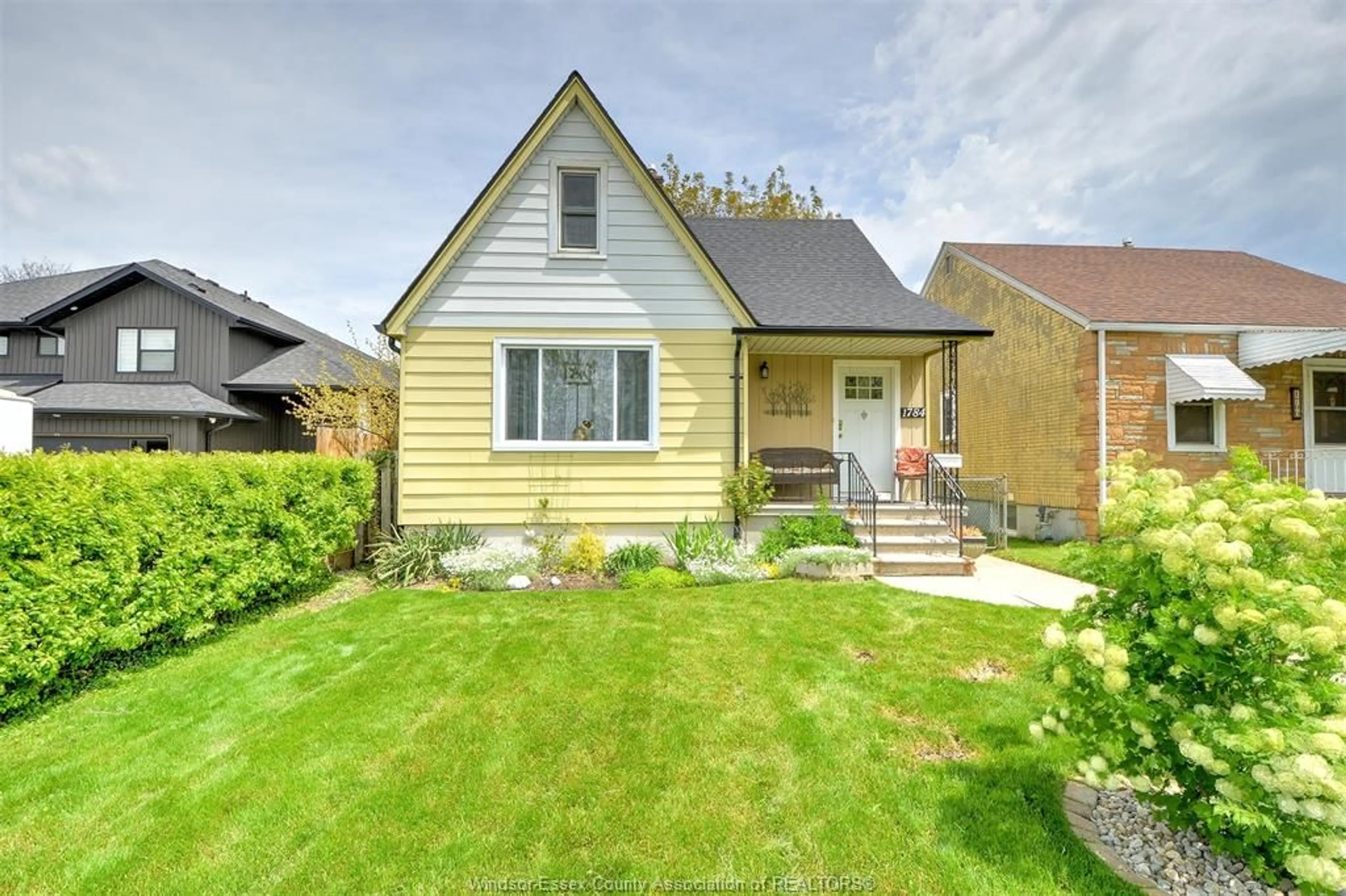 Home with vinyl exterior material, street for 1784 PIERRE Ave, Windsor Ontario N8W 2J6