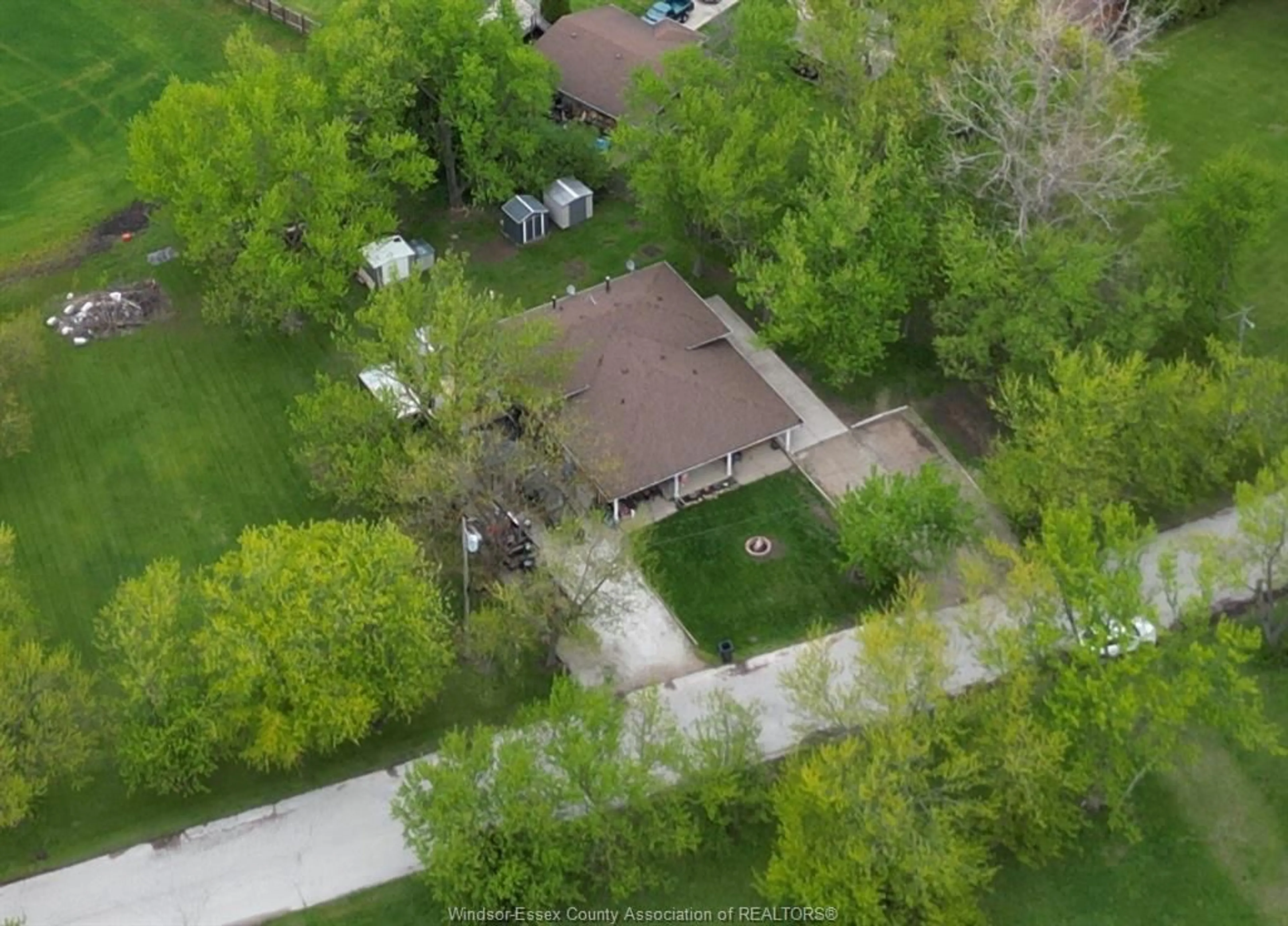 A pic from outside/outdoor area/front of a property/back of a property/a pic from drone, street for 4650-4666 CABOTO Dr, LaSalle Ontario N9H 0H2