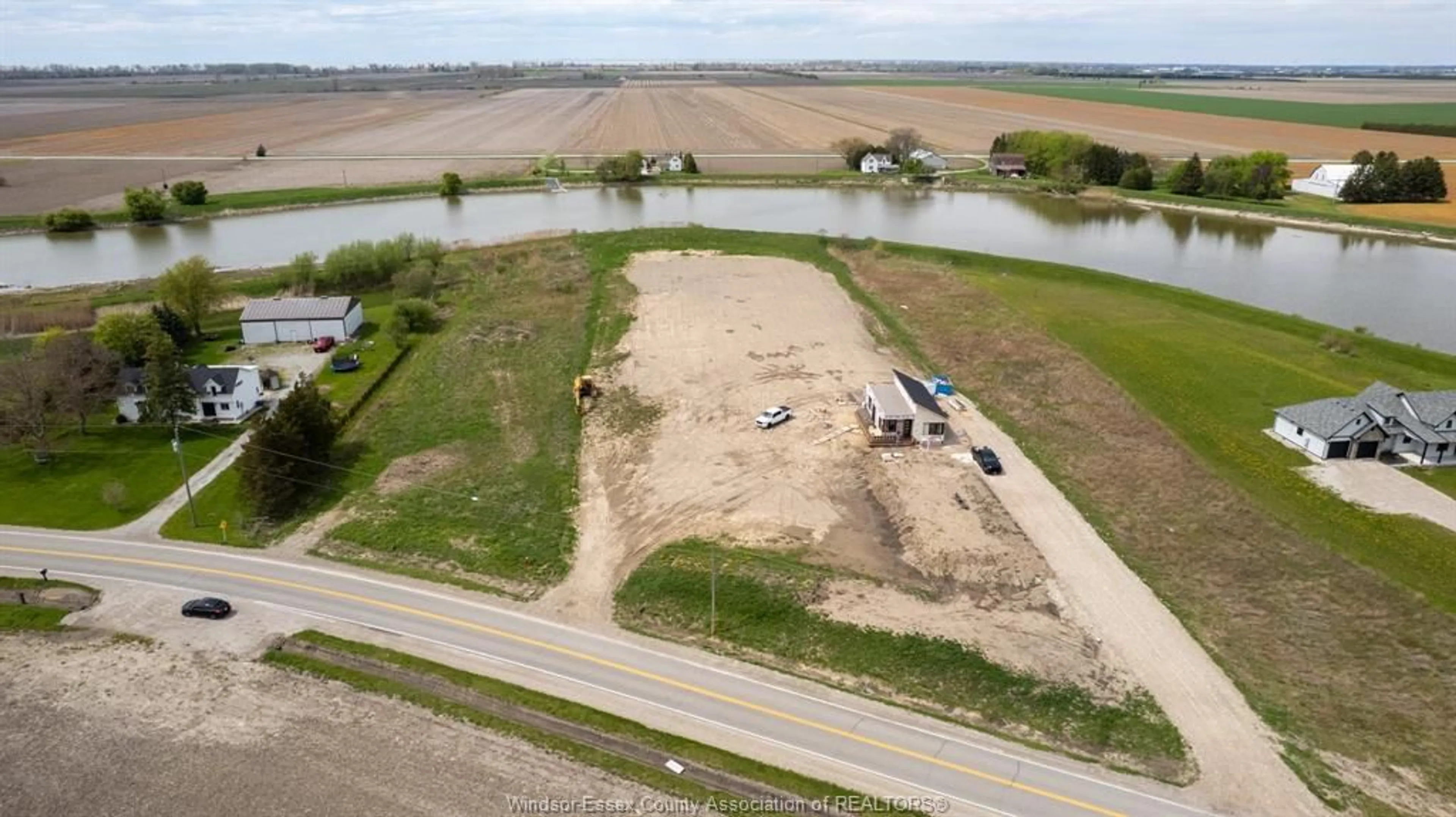 A pic from outside/outdoor area/front of a property/back of a property/a pic from drone, water/lake/river/ocean view for 5273 TECUMSEH Line, Tilbury Ontario N0P 2L0