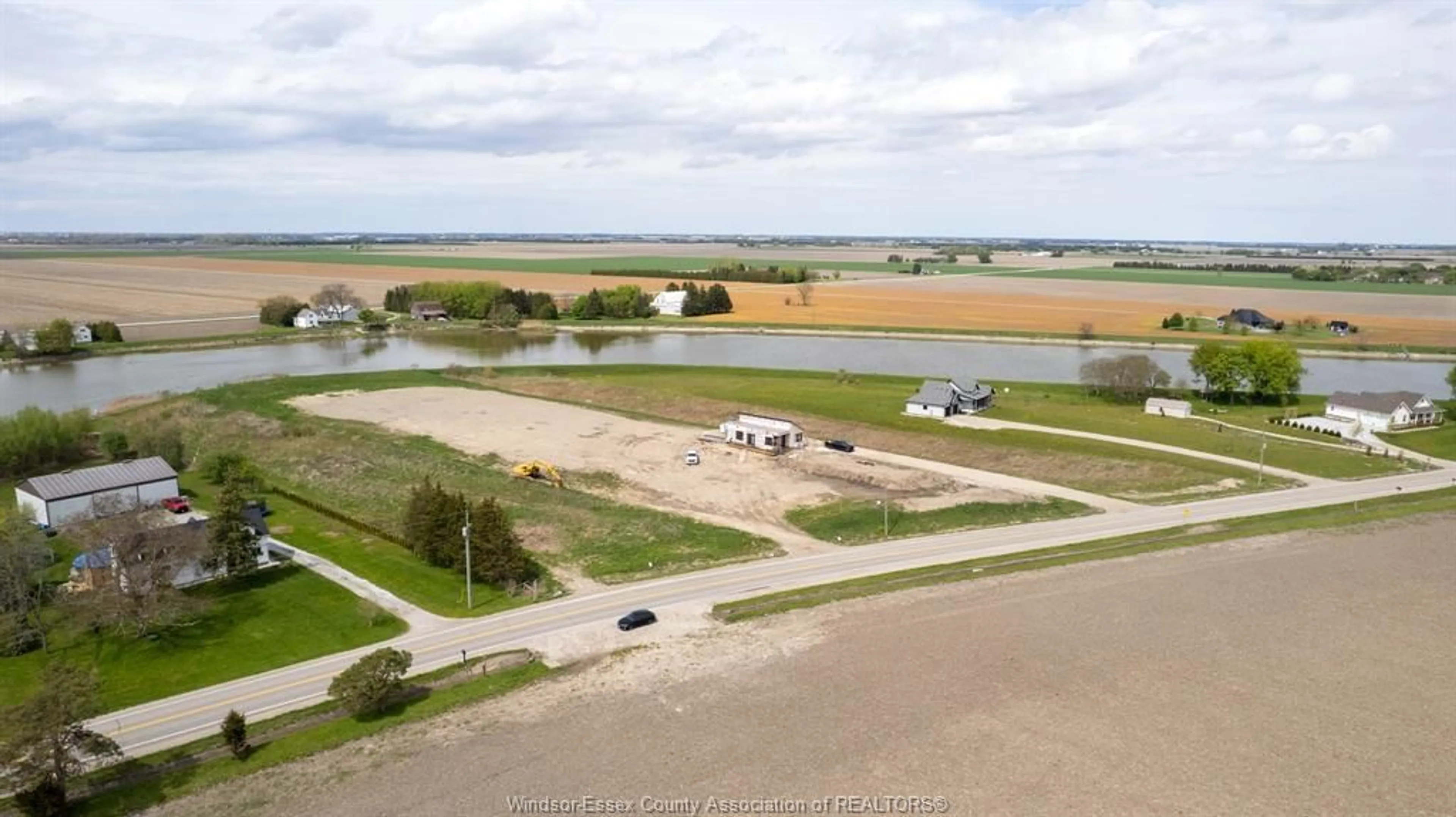 A pic from outside/outdoor area/front of a property/back of a property/a pic from drone, water/lake/river/ocean view for 5273 TECUMSEH Line, Tilbury Ontario N0P 2L0