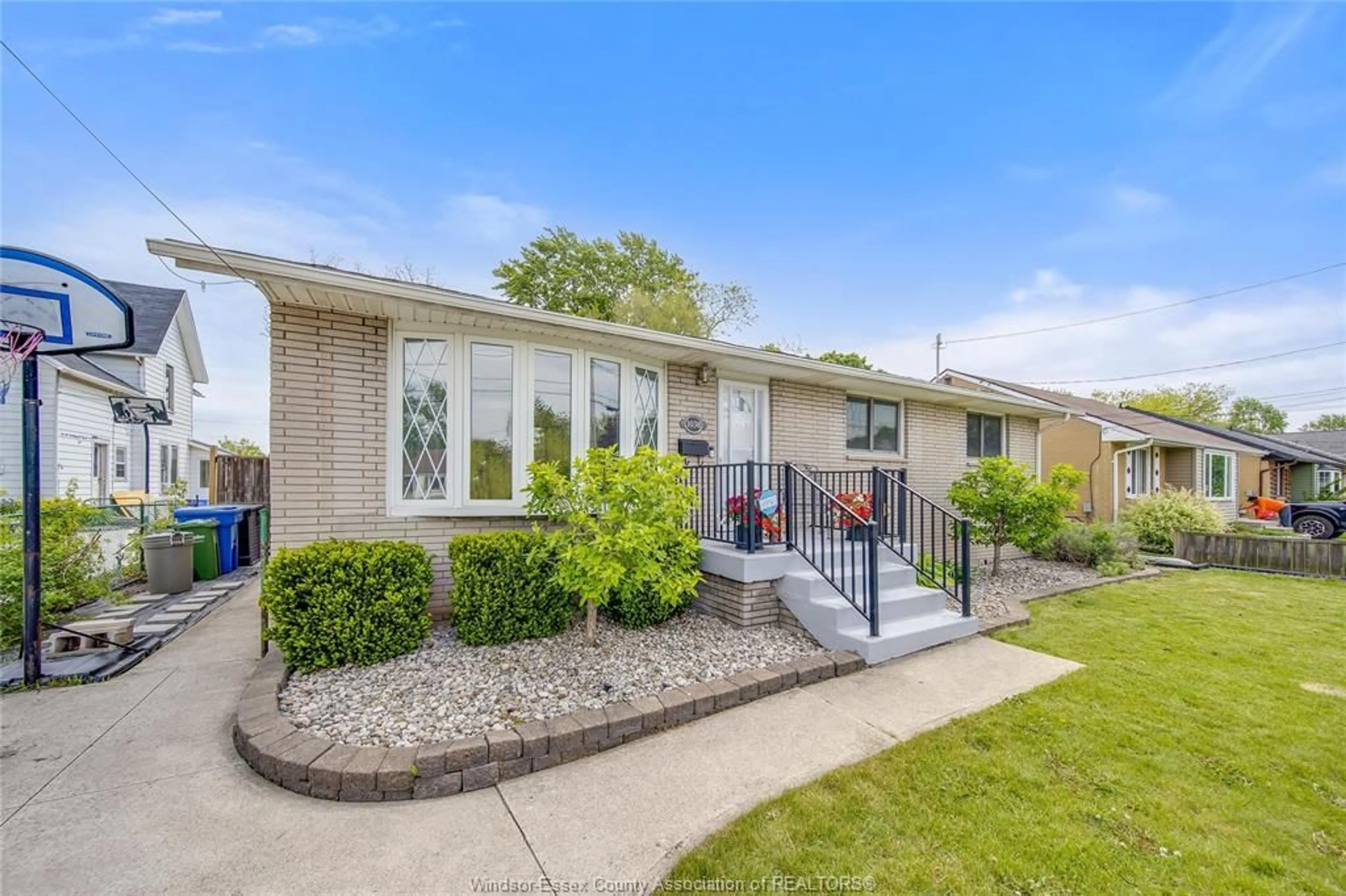 Home with brick exterior material, street for 1038 DOT Ave, Windsor Ontario N9C 3H8