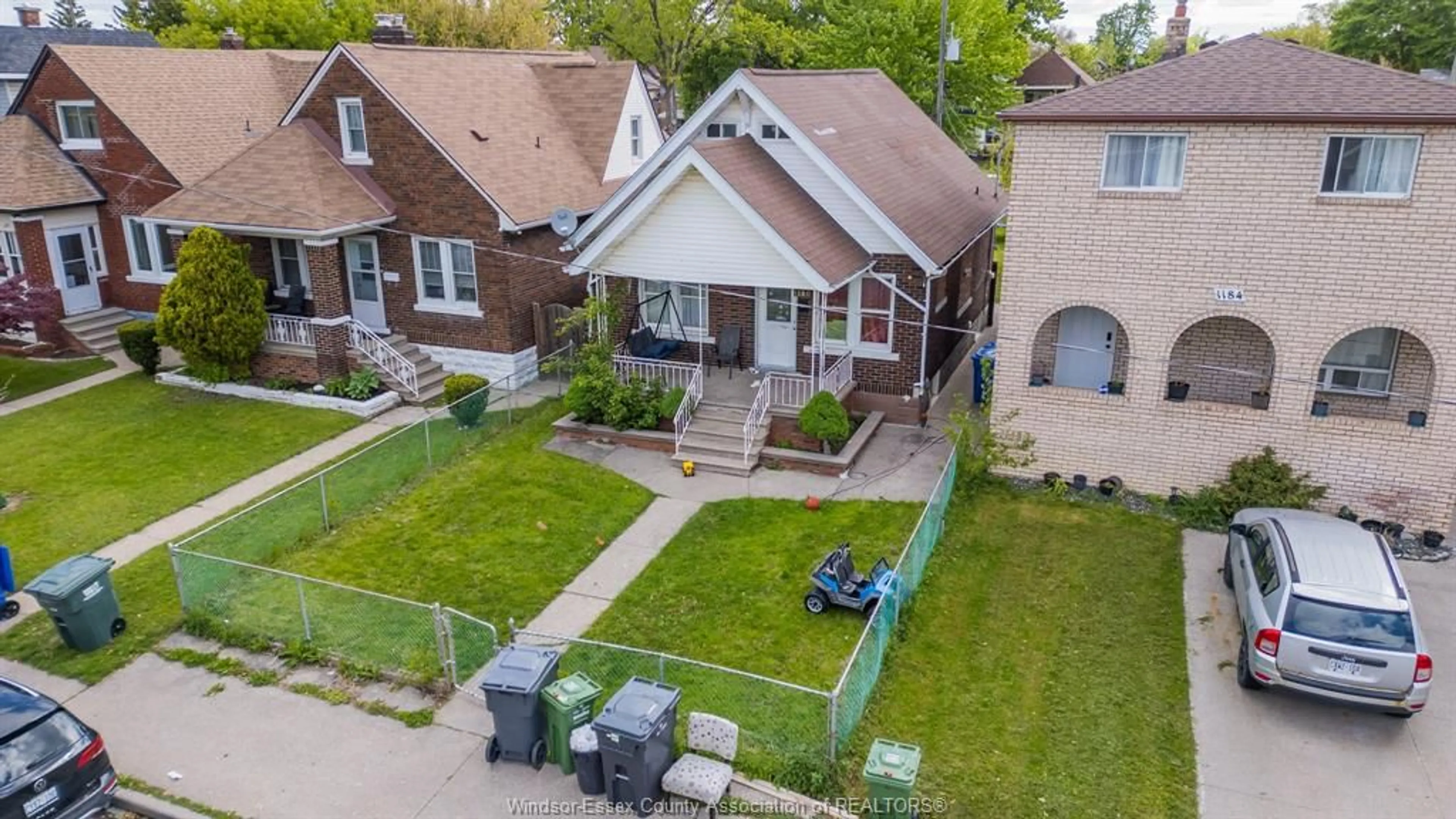 A pic from outside/outdoor area/front of a property/back of a property/a pic from drone, street for 1180 LANGLOIS Ave, Windsor Ontario N9A 2H5