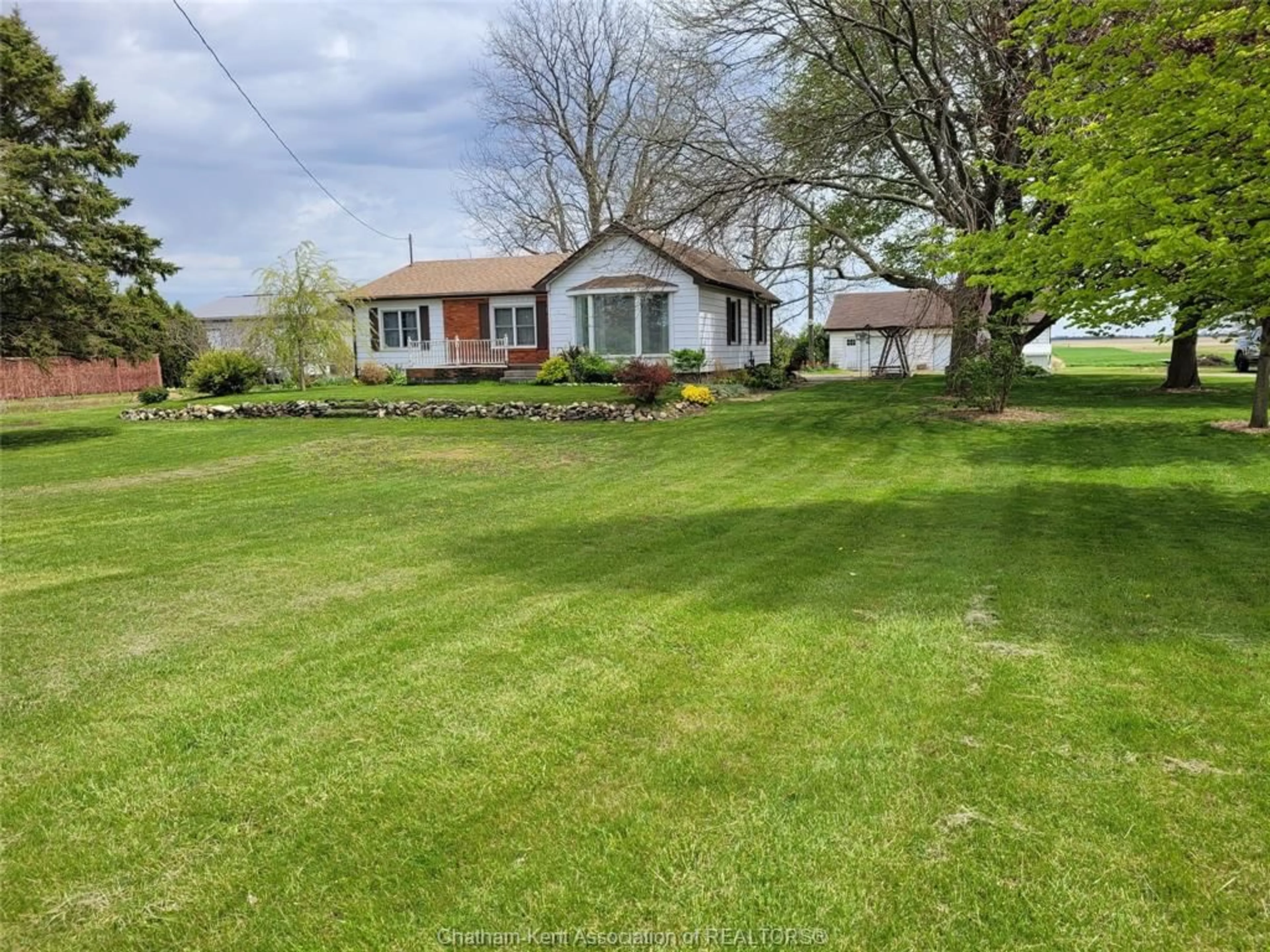 A pic from outside/outdoor area/front of a property/back of a property/a pic from drone, street for 10238 FAIRVIEW Line, Chatham-Kent Ontario N7M 5J4