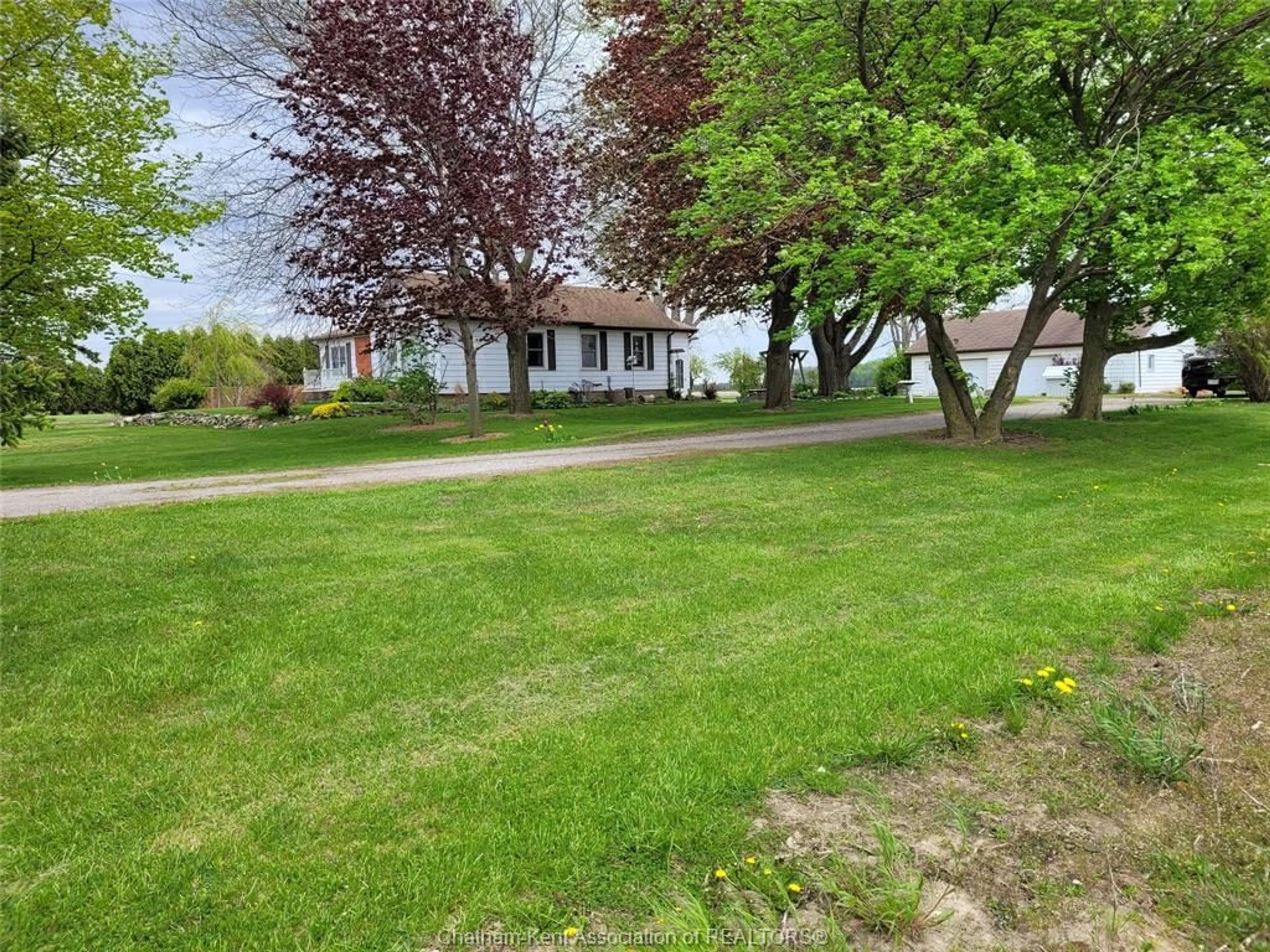 A pic from outside/outdoor area/front of a property/back of a property/a pic from drone, street for 10238 FAIRVIEW Line, Chatham-Kent Ontario N7M 5J4