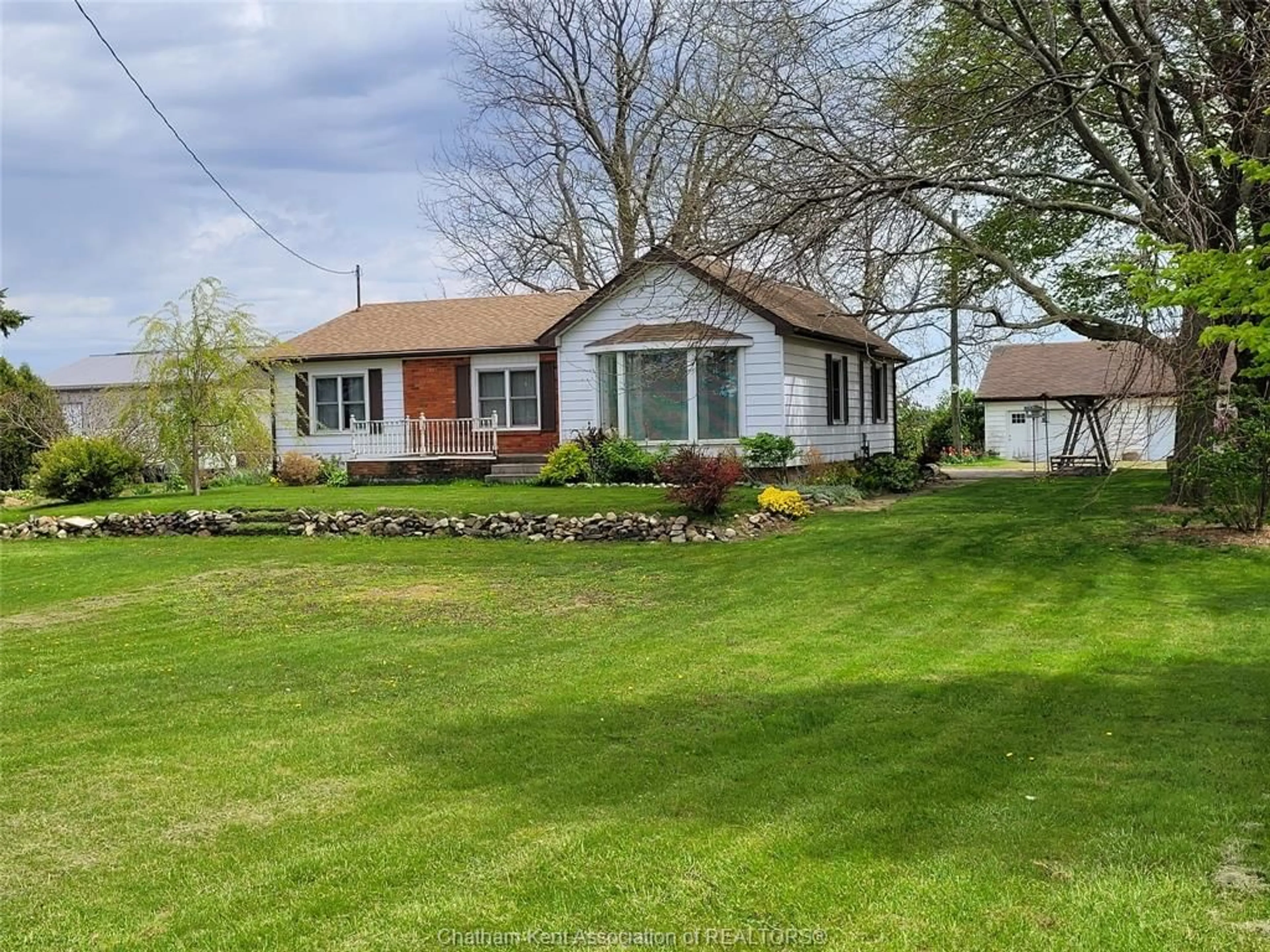 A pic from outside/outdoor area/front of a property/back of a property/a pic from drone, street for 10238 FAIRVIEW Line, Chatham-Kent Ontario N7M 5J4