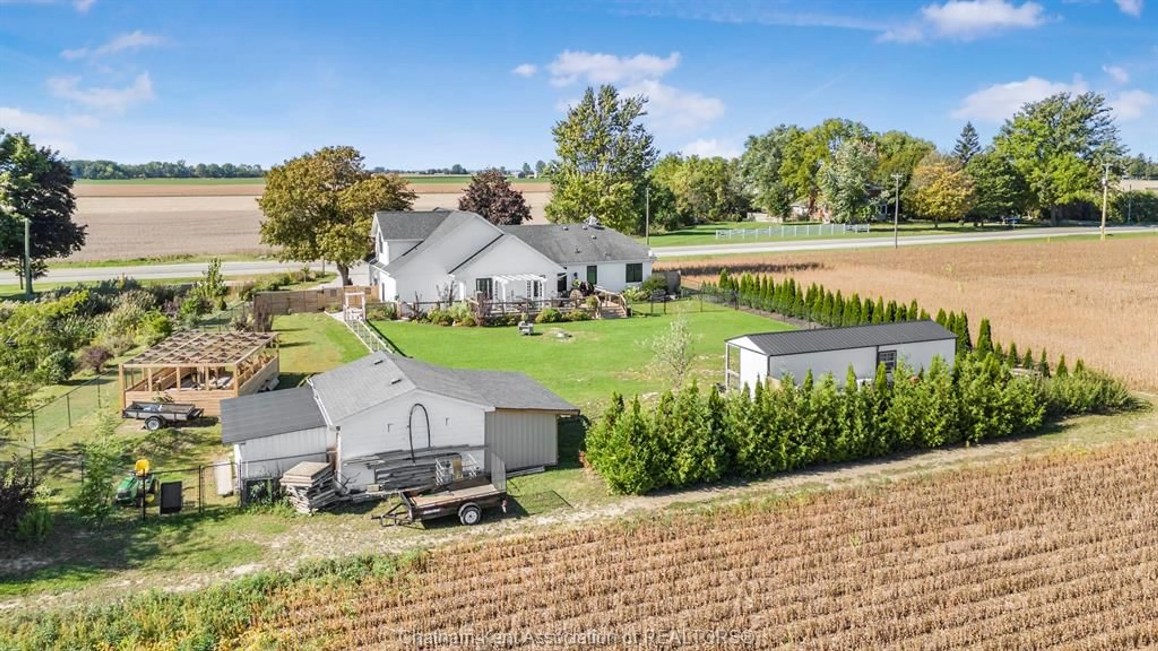 A pic from outside/outdoor area/front of a property/back of a property/a pic from drone, unknown for 24947 Bear Line Rd, Chatham-Kent Ontario N7M 5J8