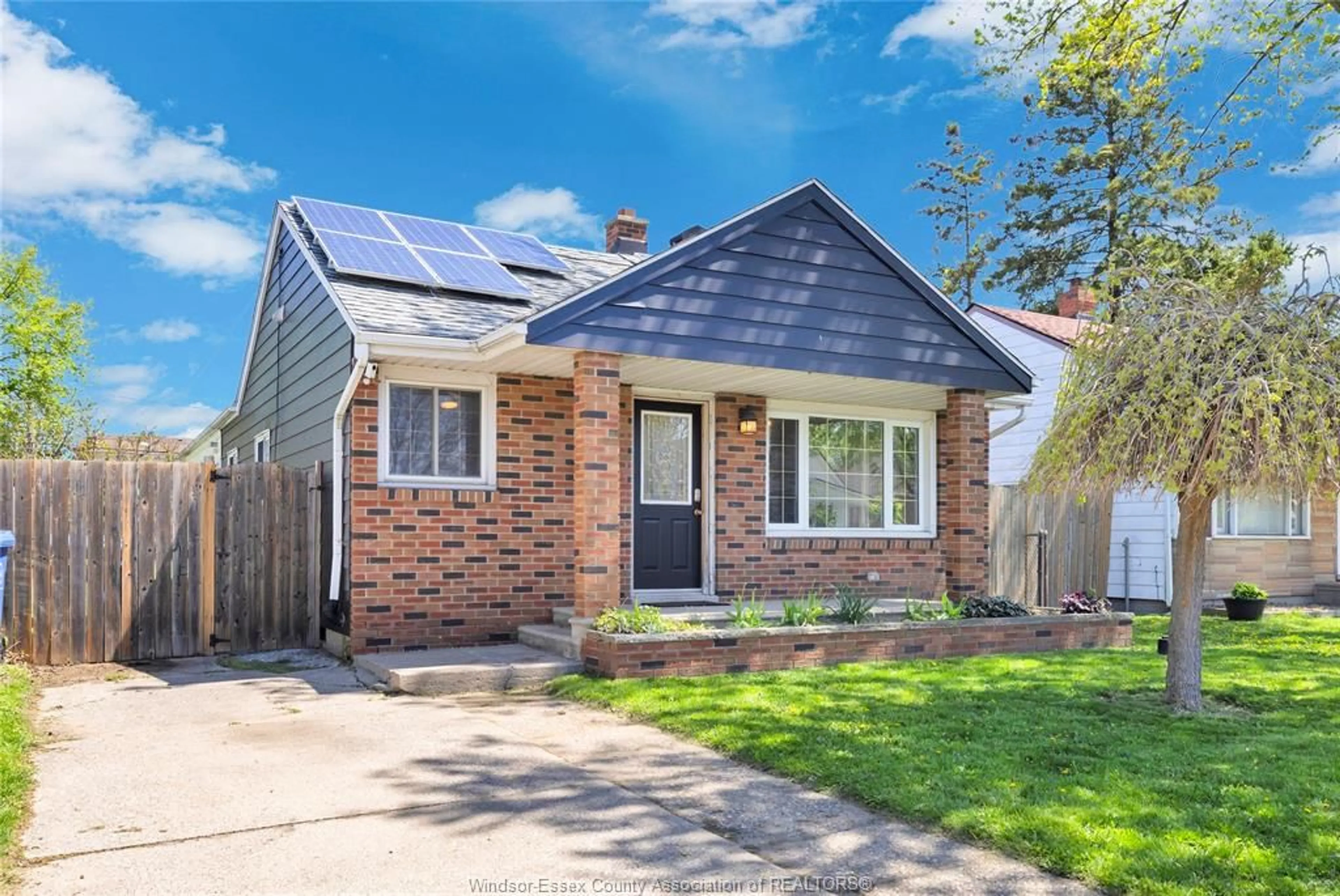 Home with brick exterior material, street for 1752 BENJAMIN, Windsor Ontario N8X 4N6