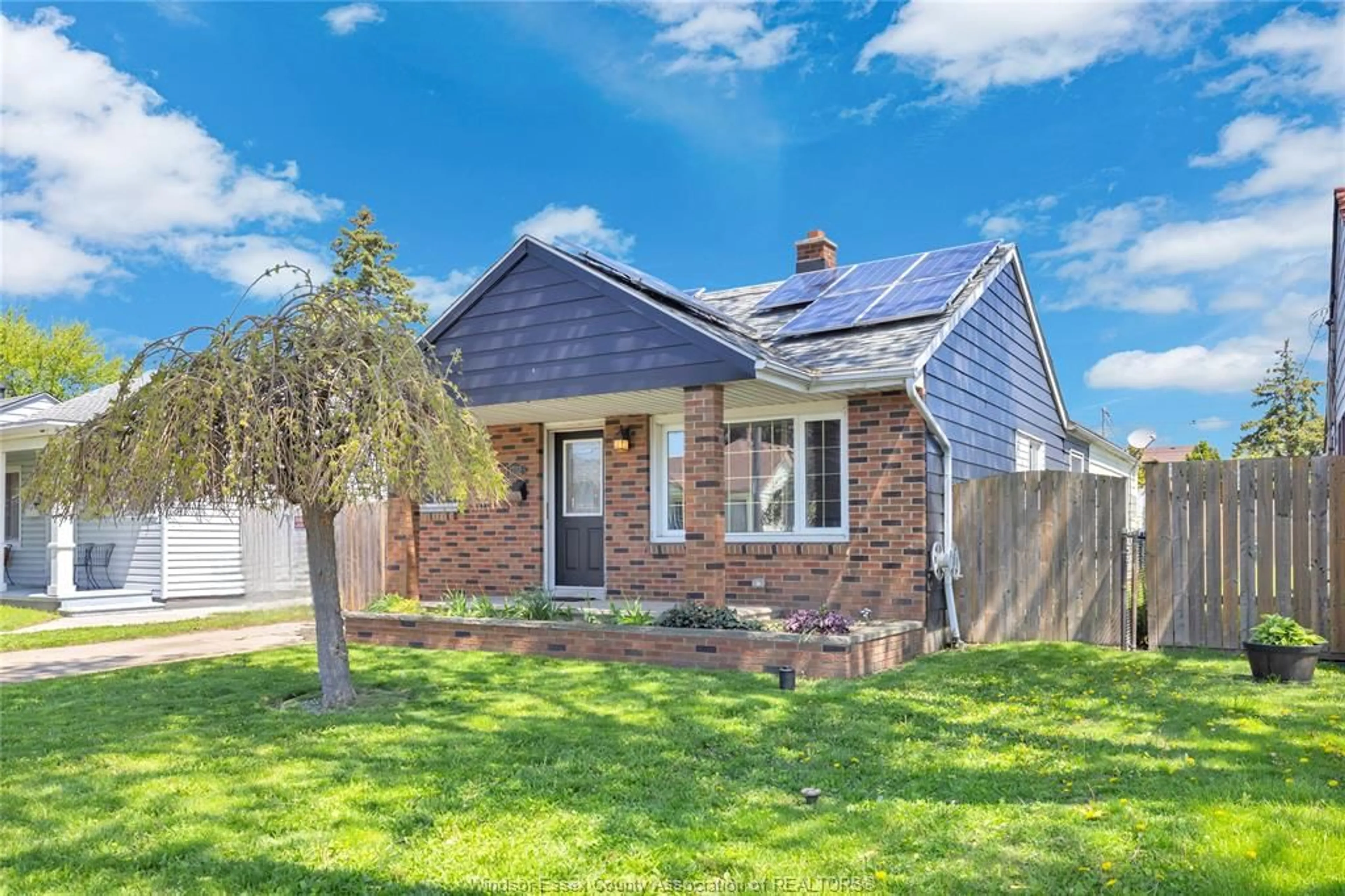 Home with brick exterior material, street for 1752 BENJAMIN, Windsor Ontario N8X 4N6
